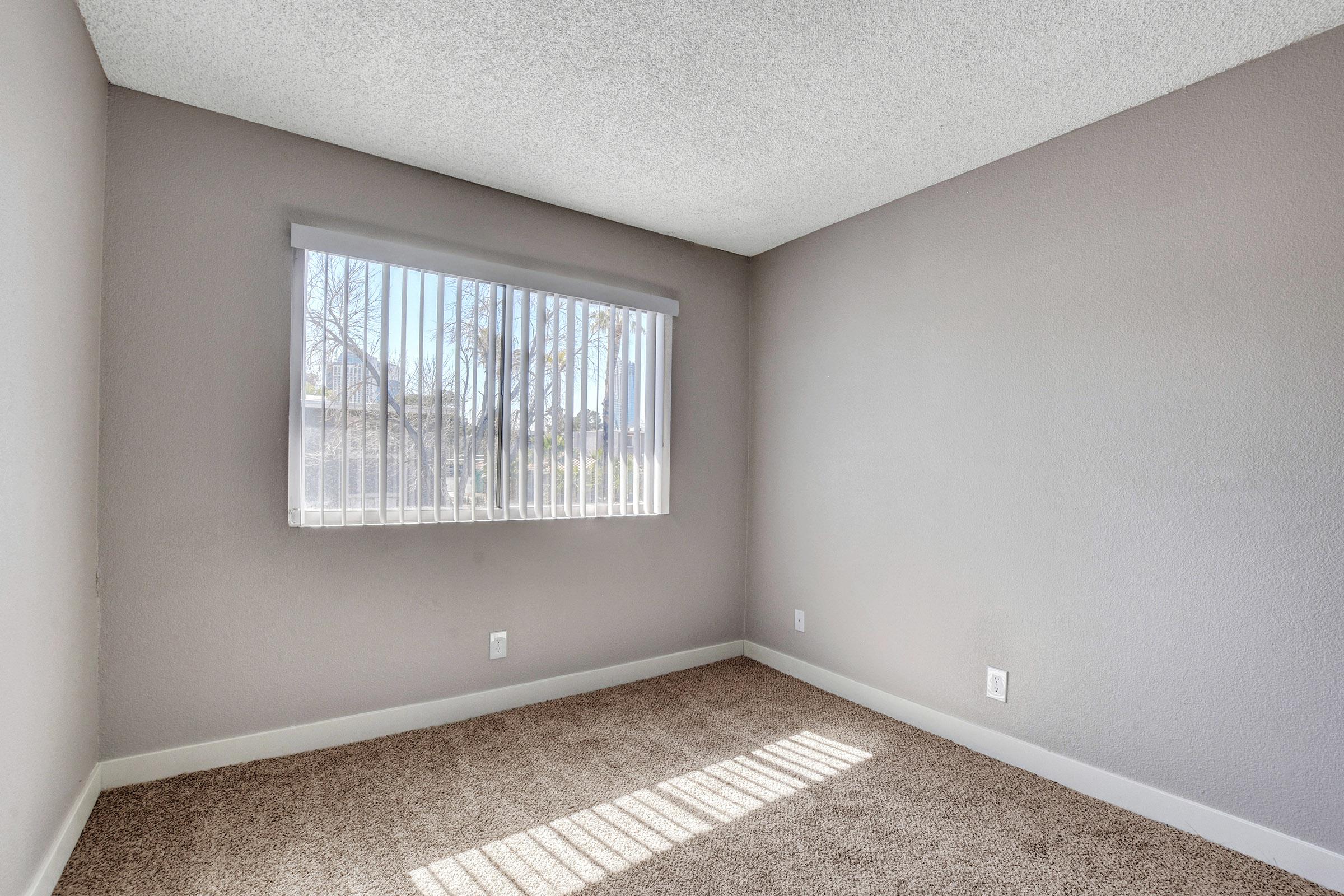 a room with a sink and a window