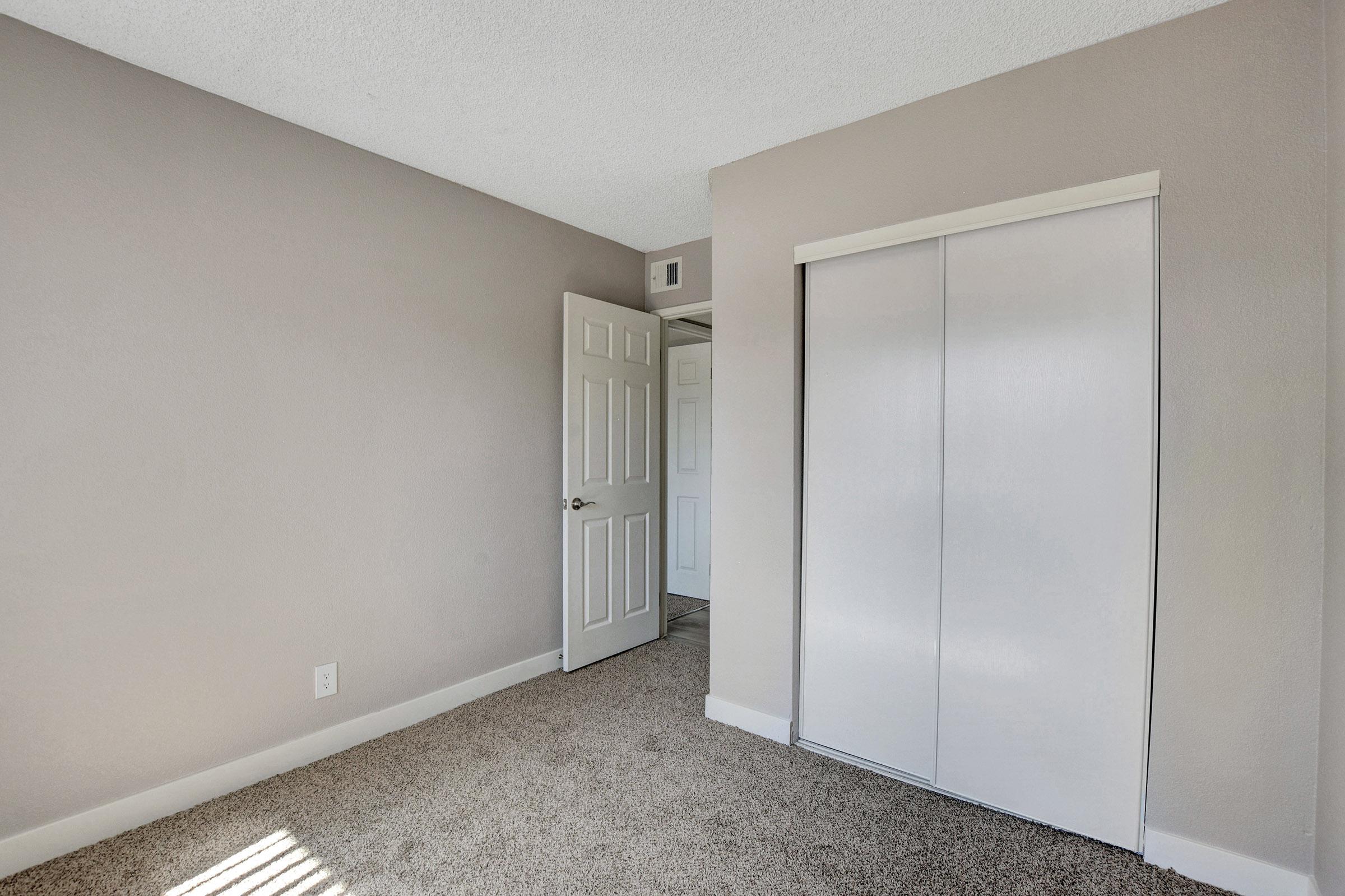 a white refrigerator freezer sitting in a room