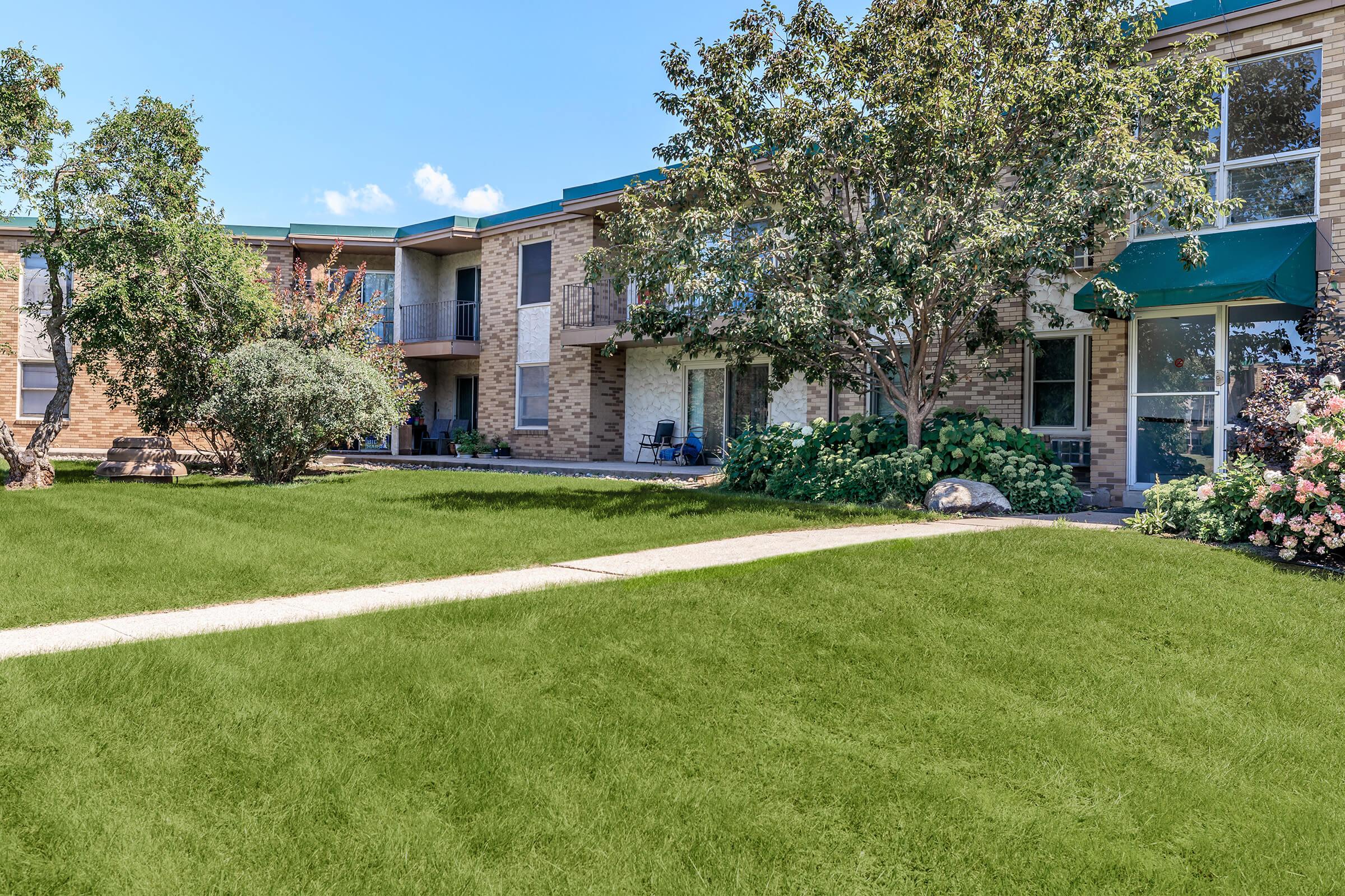 a large lawn in front of a house