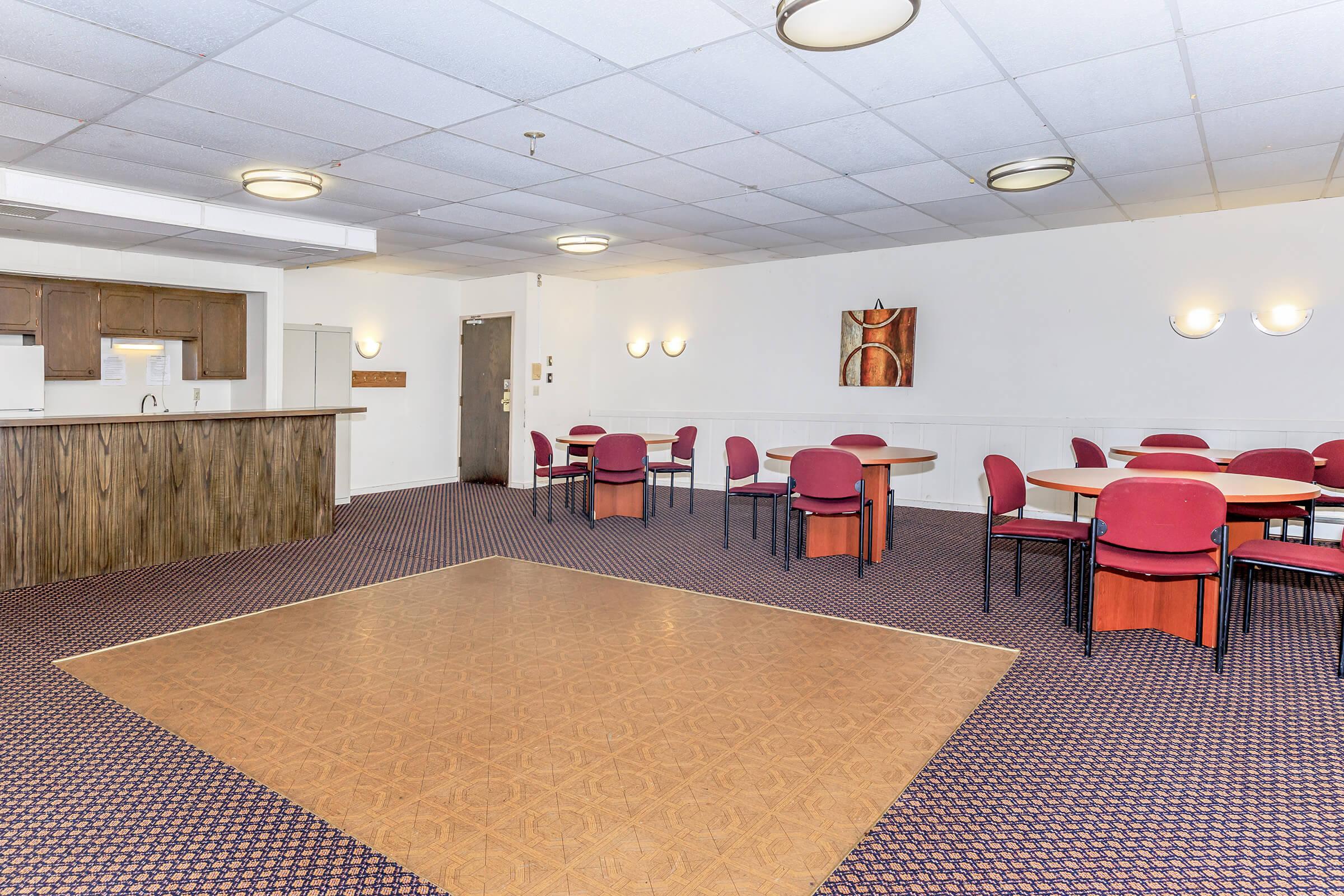 a room filled with furniture and a rug