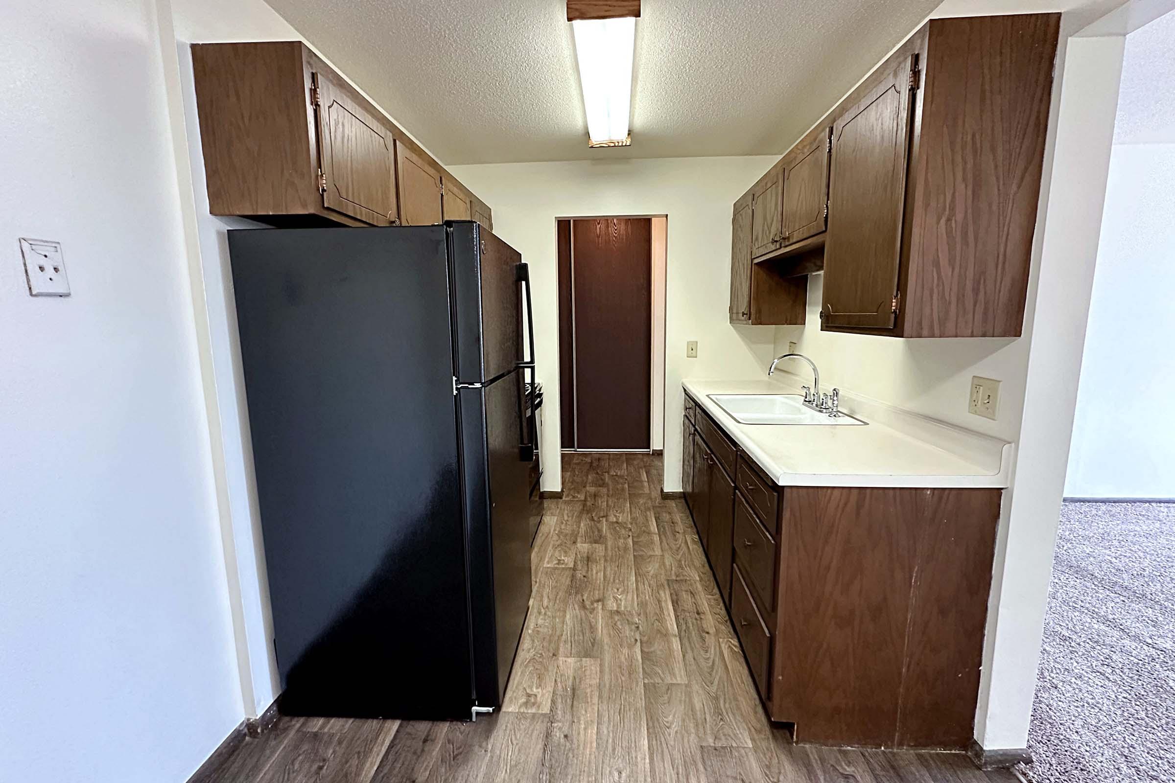 a stainless steel refrigerator in a kitchen