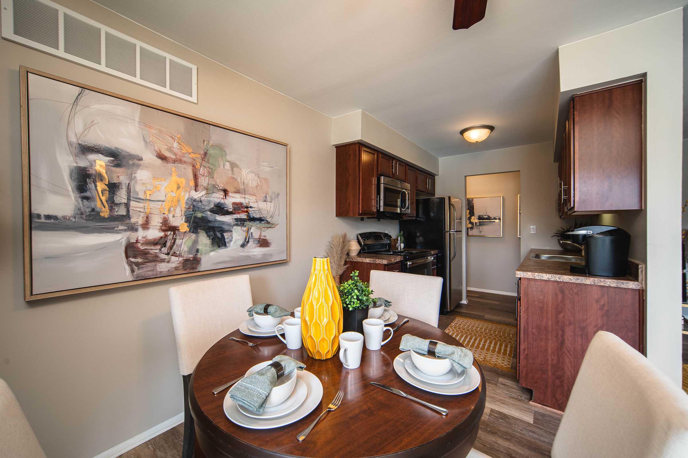 a kitchen with a dining table