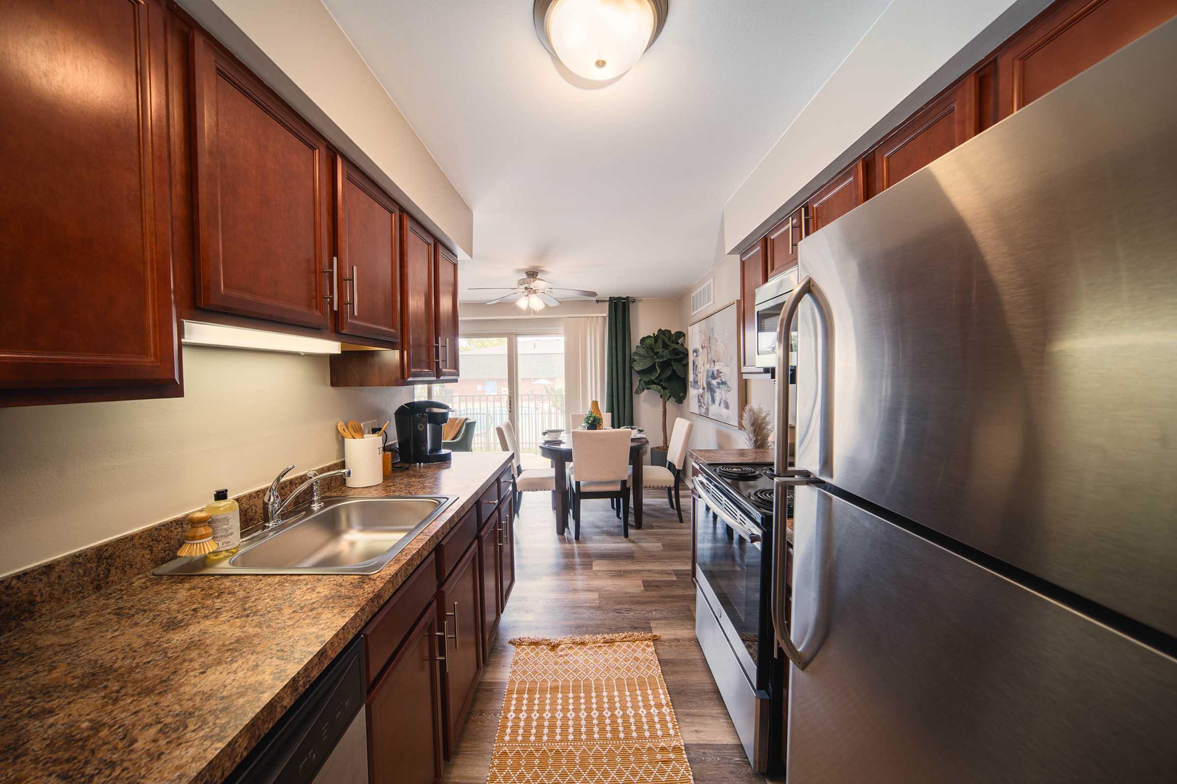 a modern kitchen with stainless steel appliances