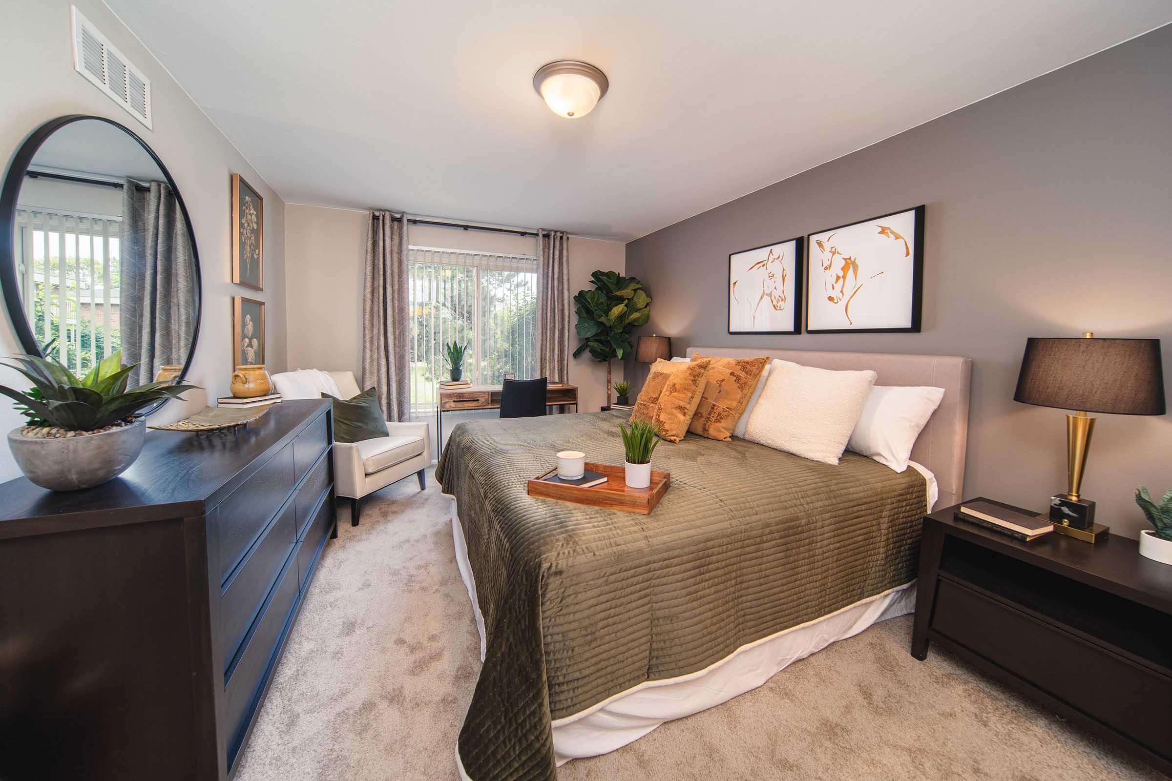 a living room filled with furniture and a flat screen tv