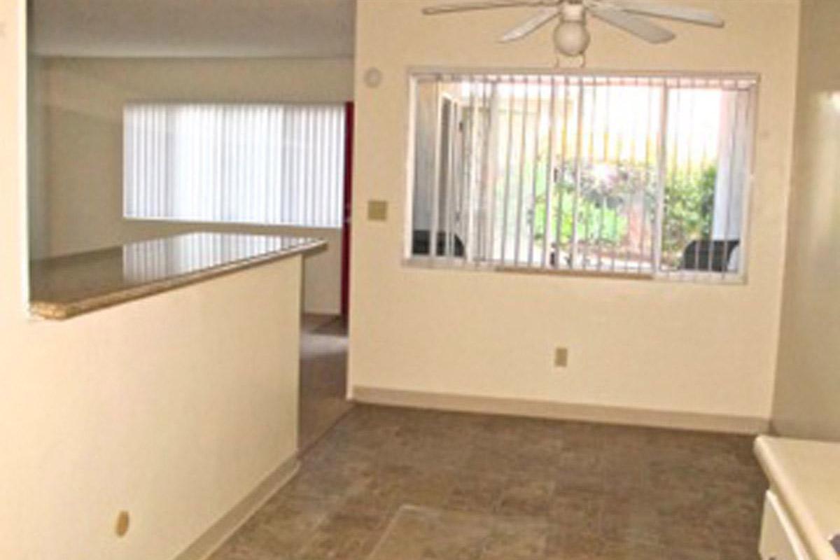 a kitchen with a sink and a window