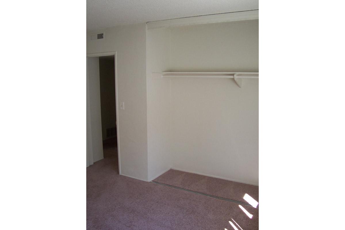 a white refrigerator freezer sitting in a room