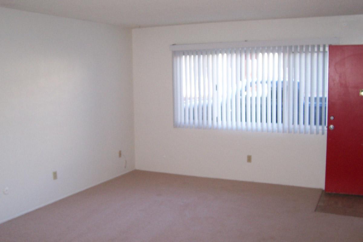 a white refrigerator freezer sitting in a room