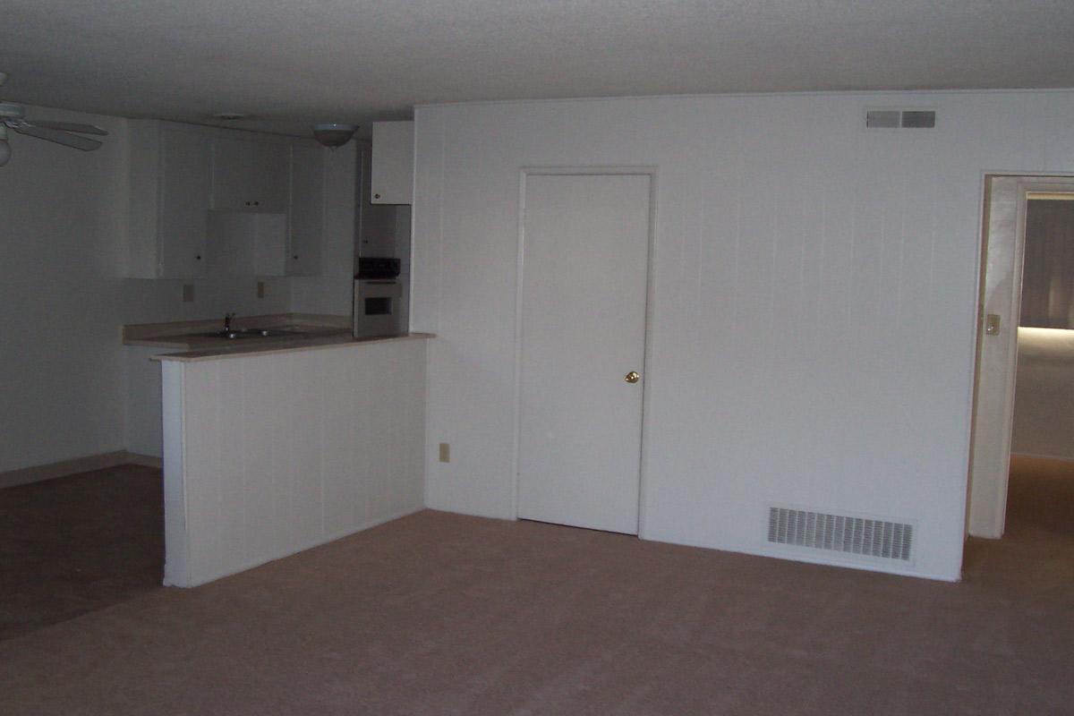 a large white refrigerator in a kitchen