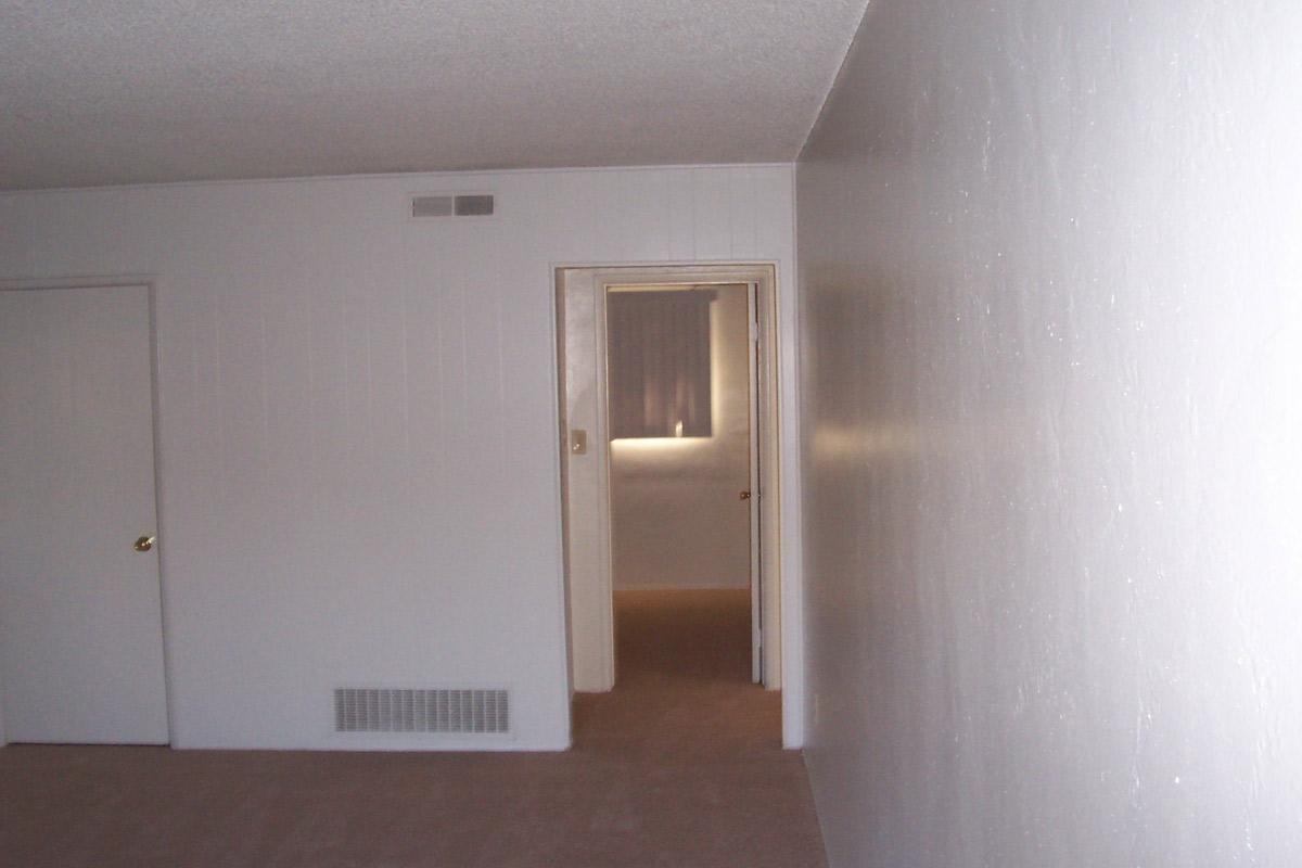 a white refrigerator freezer sitting in a room