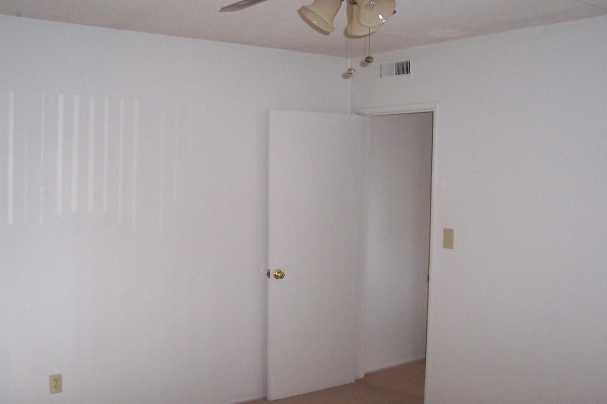 a white refrigerator freezer sitting in a room