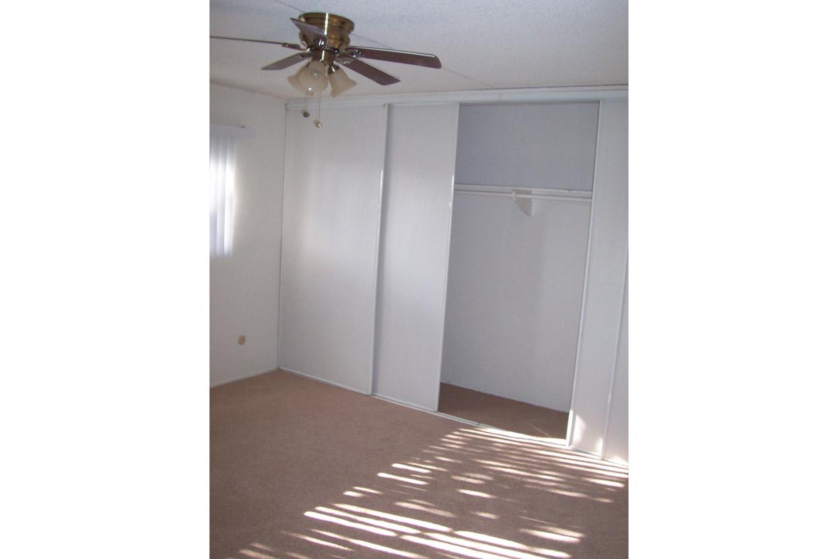 a white refrigerator freezer sitting in a room