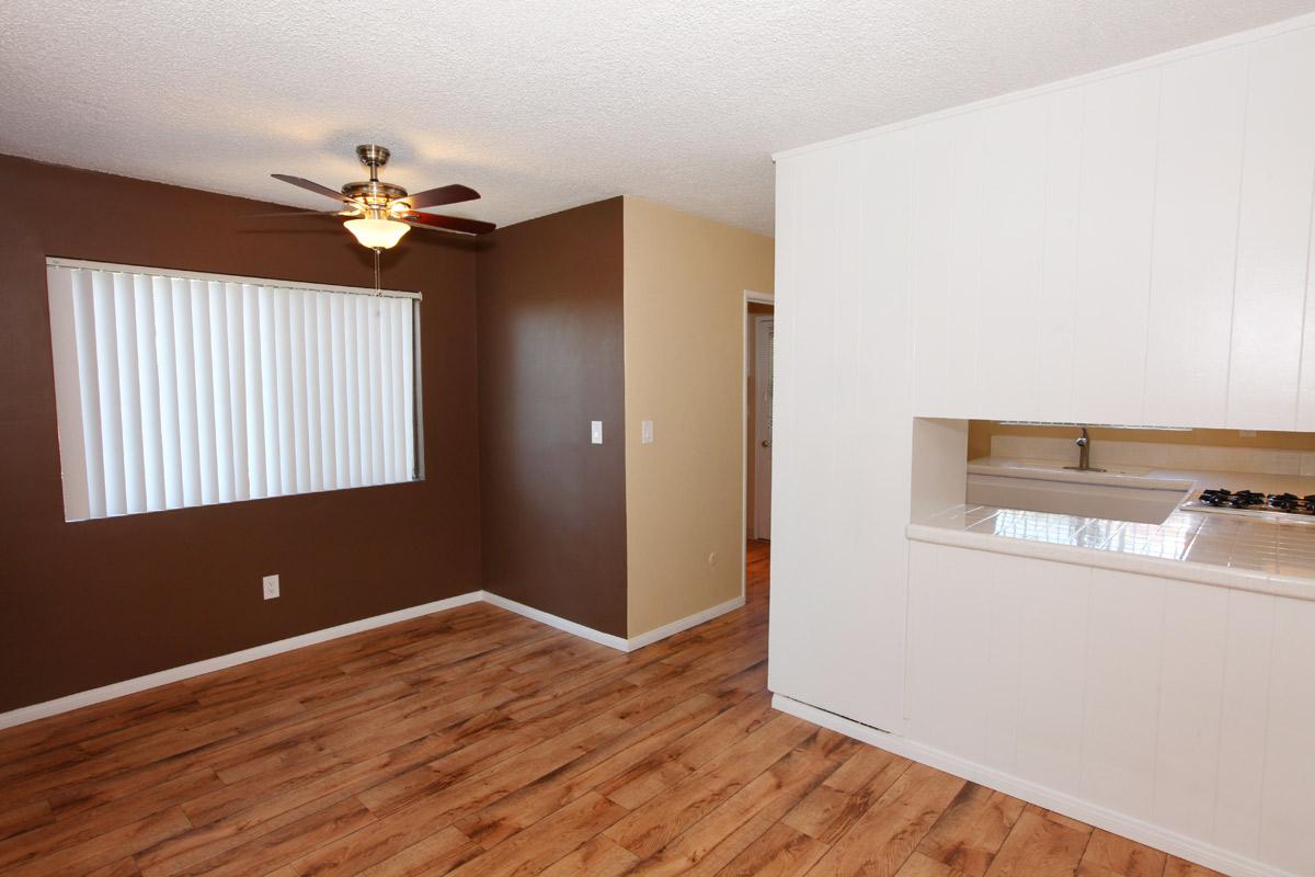 a kitchen with a wood floor