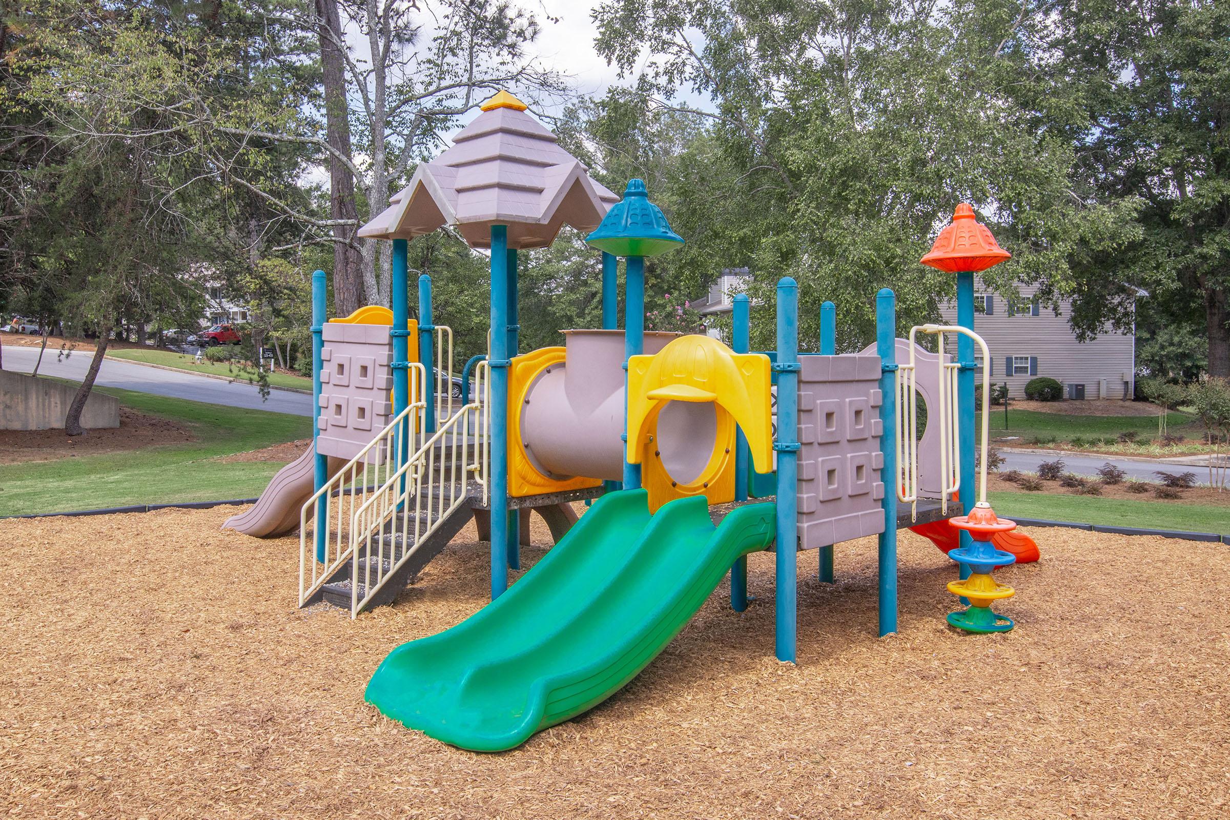 a toy train on a playground