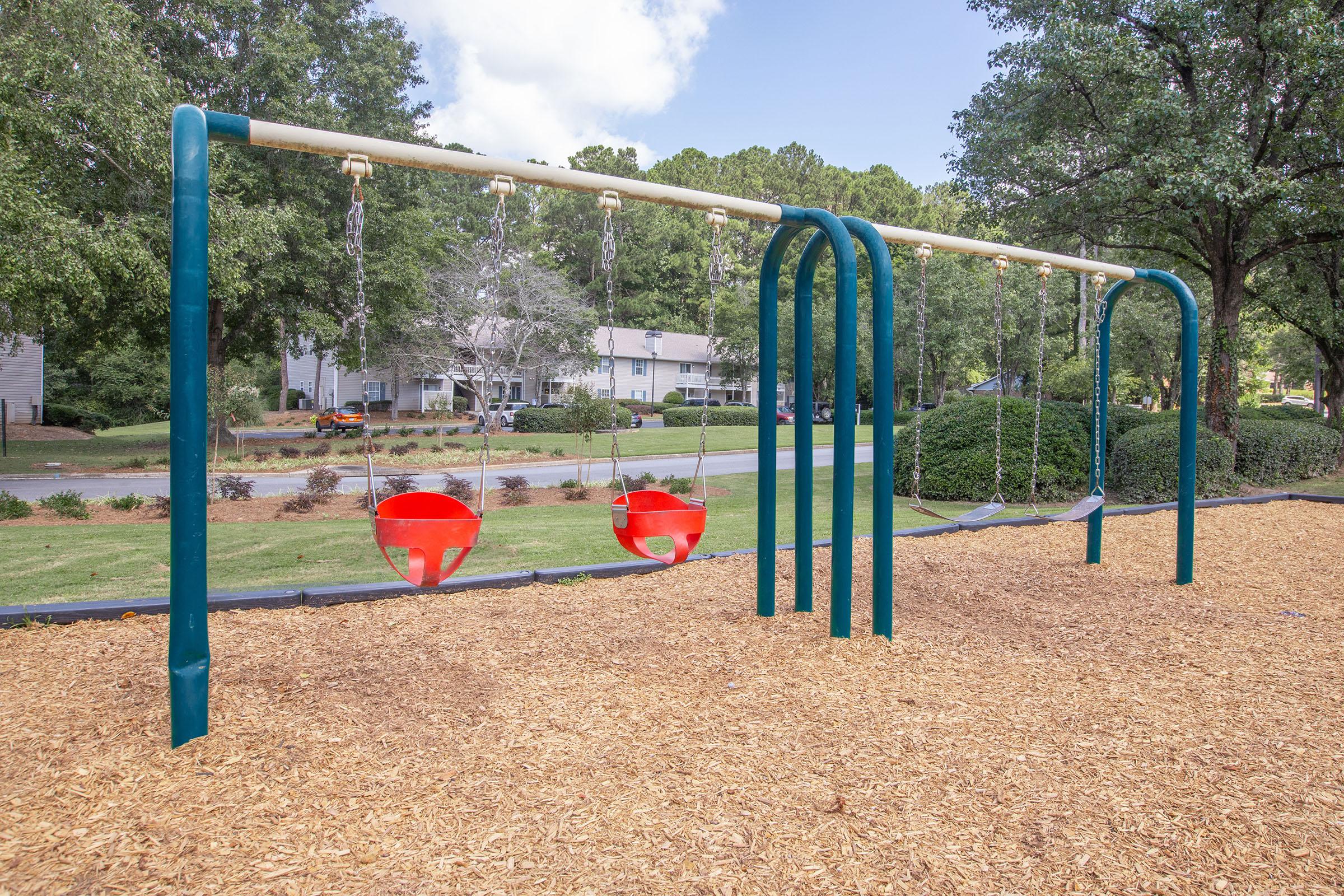 a playground inside a fence