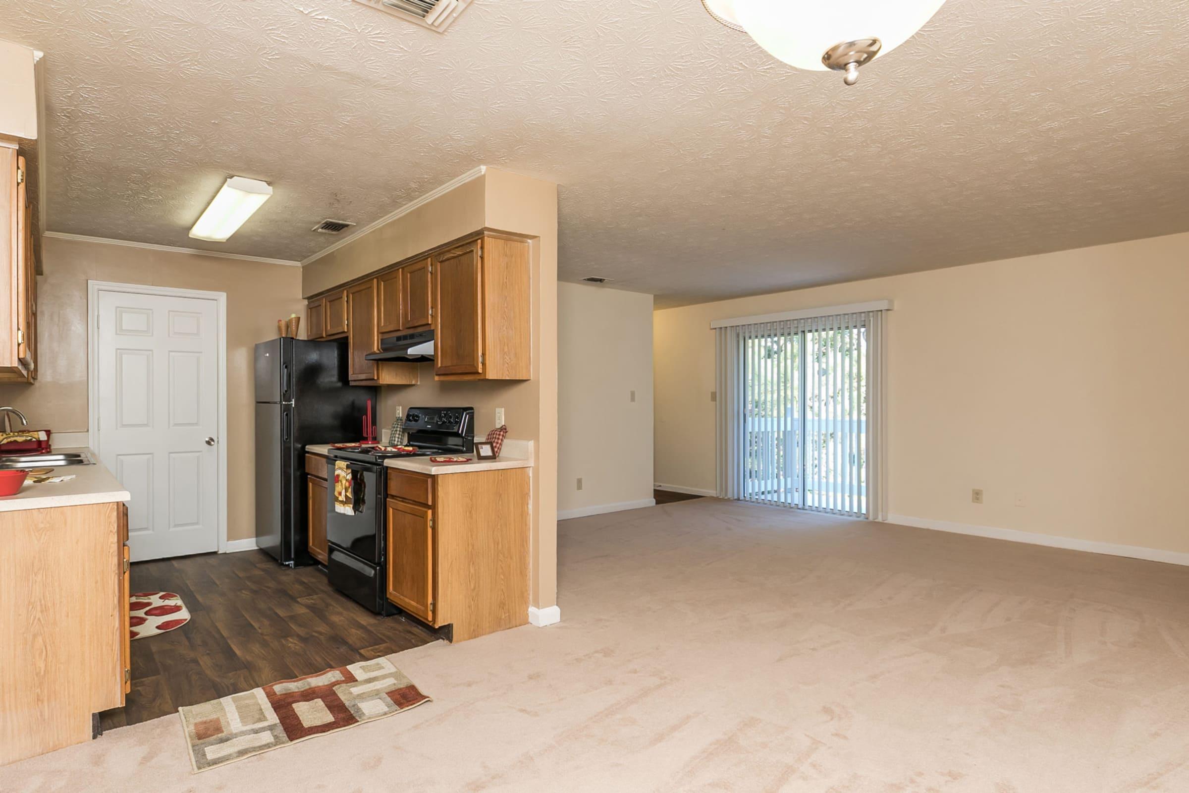 a kitchen with a wood floor