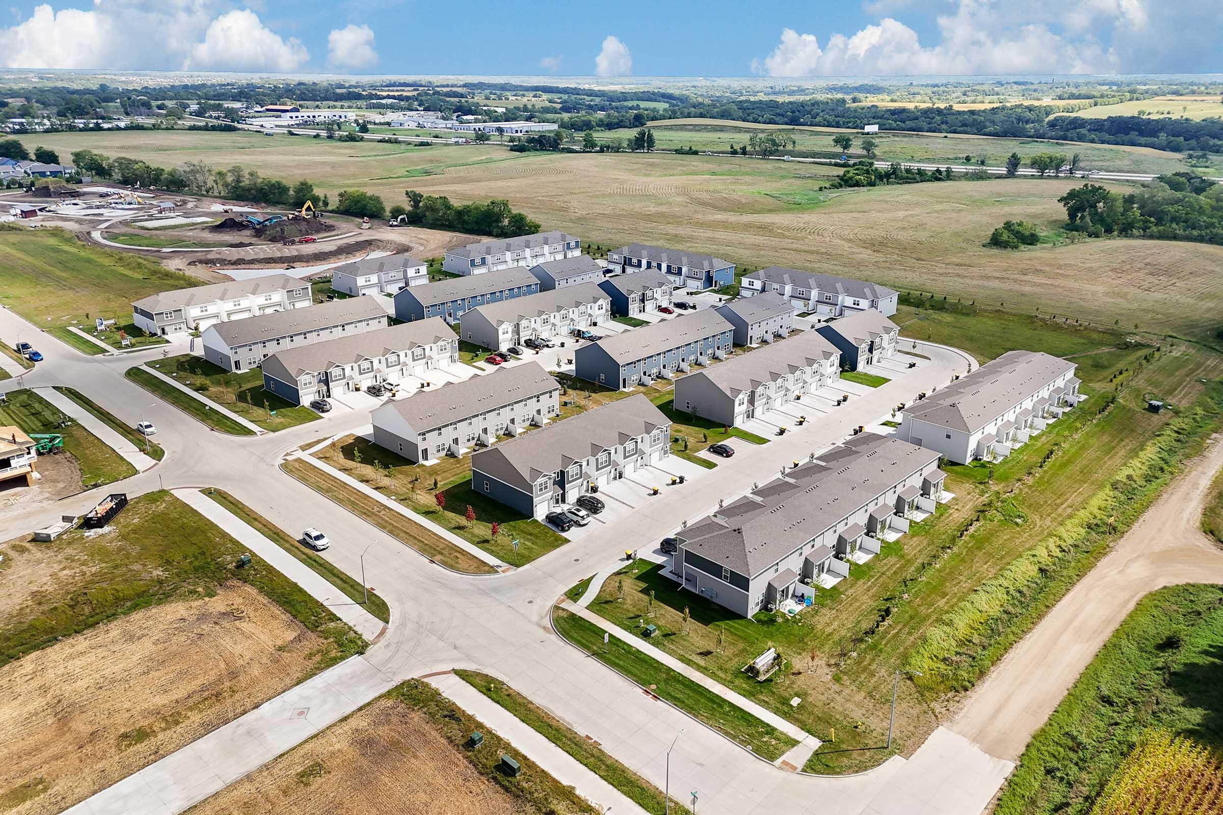 Aerial view of brand-new Painted Woods Villas townhome community in Waukee near West Des Moines.