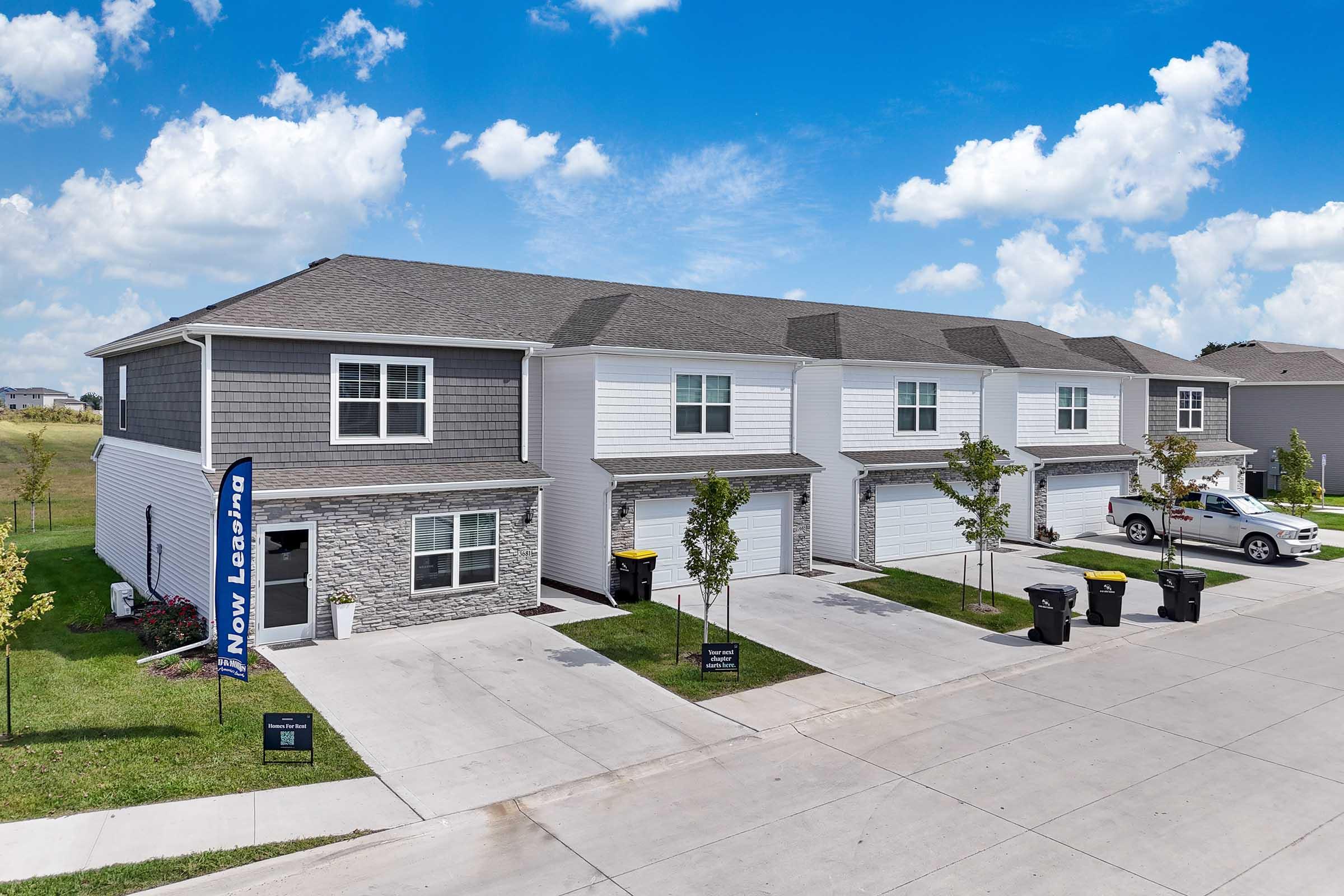 Spacious new construction townhomes with private garages for rent at Painted Woods Villas in Waukee, IA.