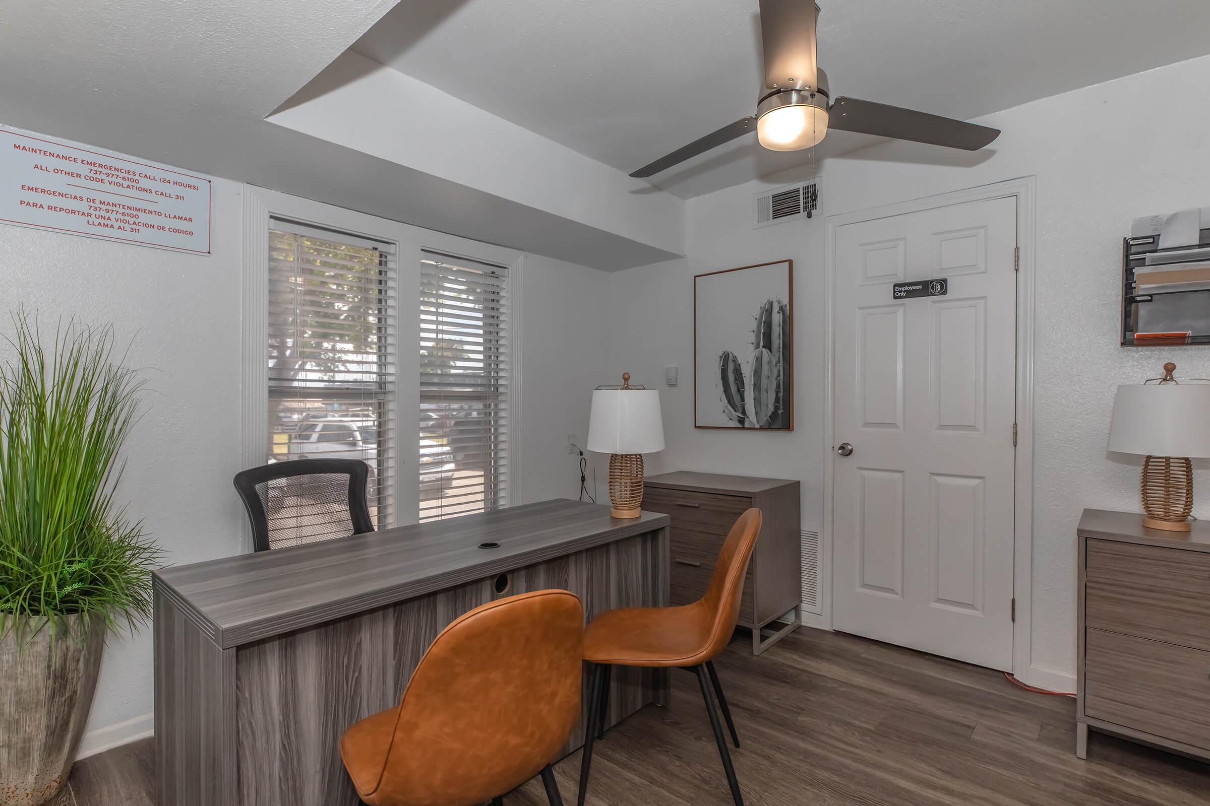 a dining room table in front of a window