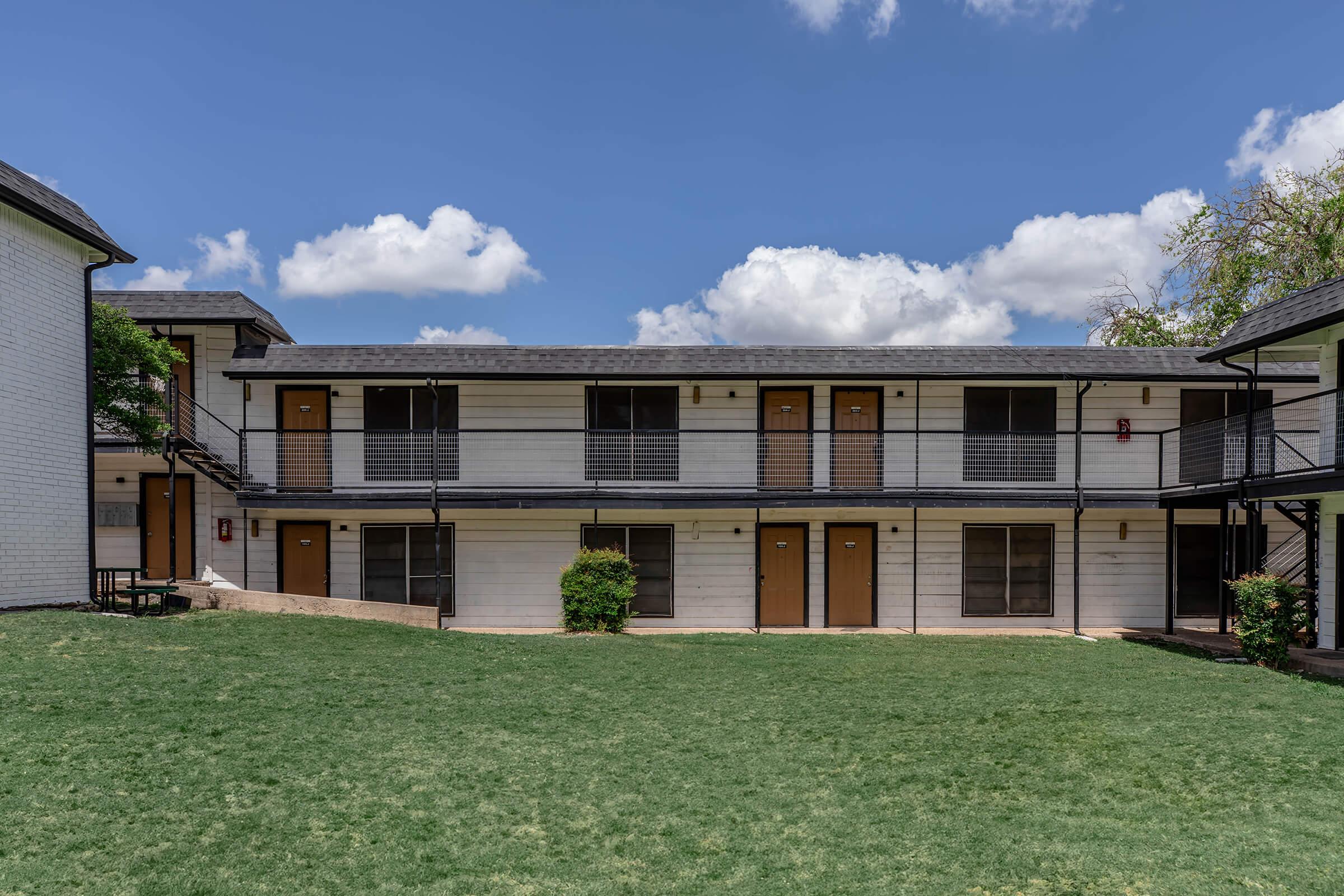 a large lawn in front of a house