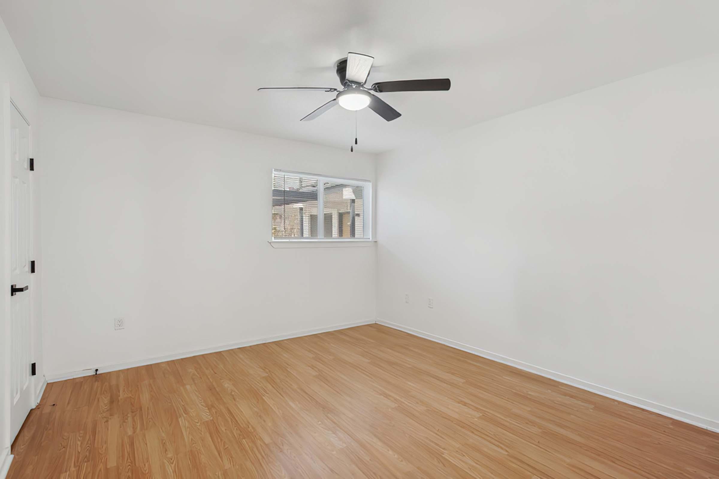 a kitchen with a wood floor