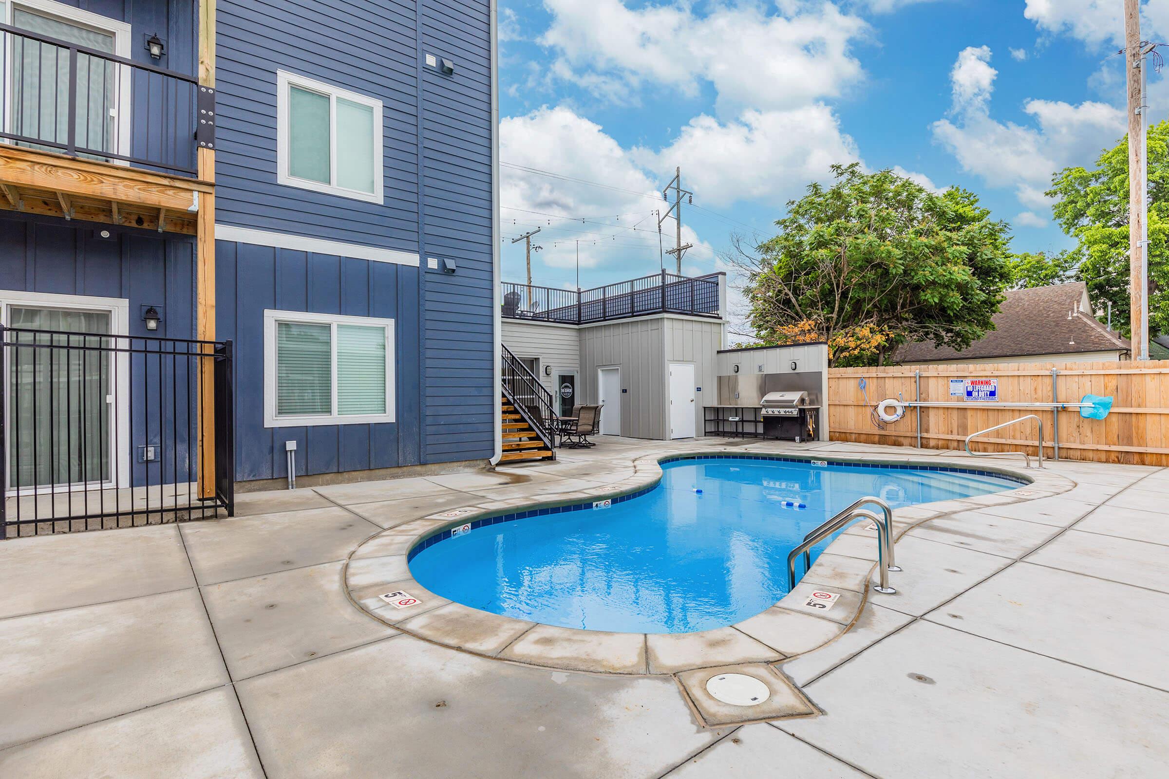 a pool next to a building