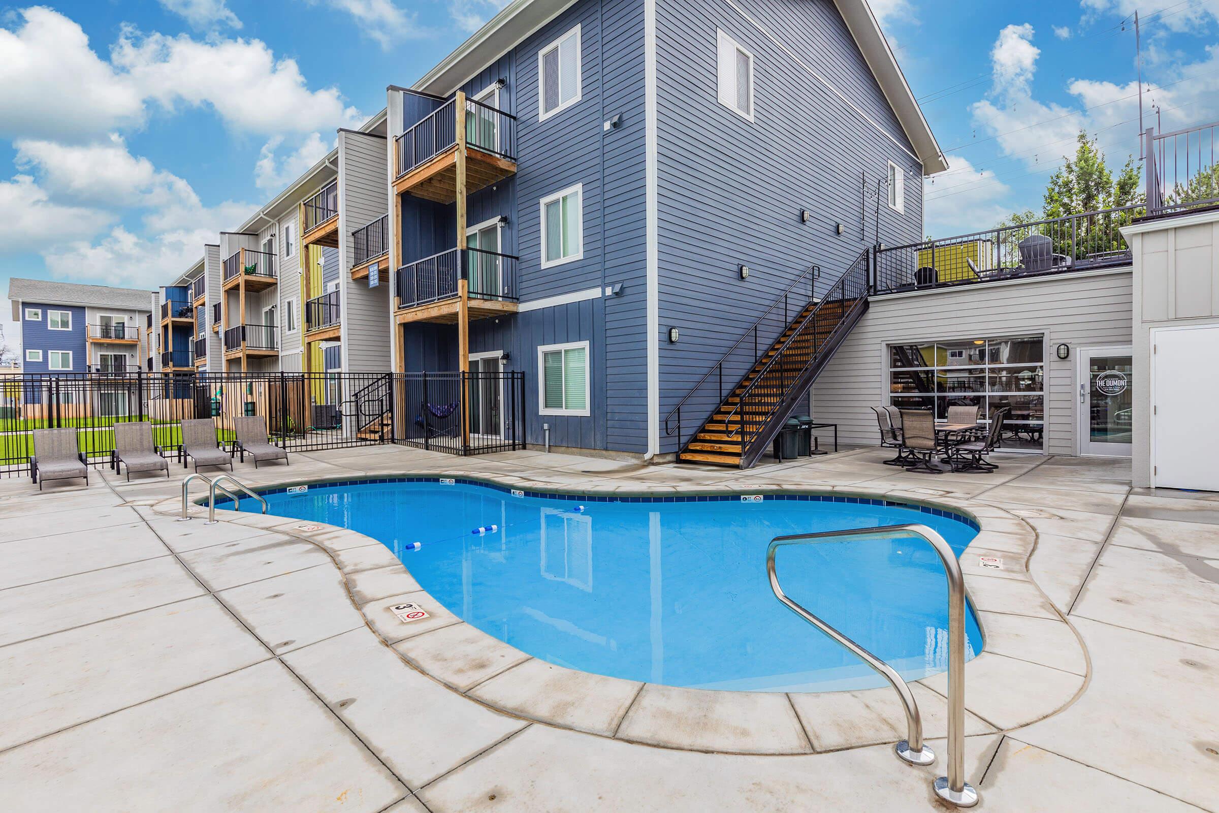 a pool next to a building