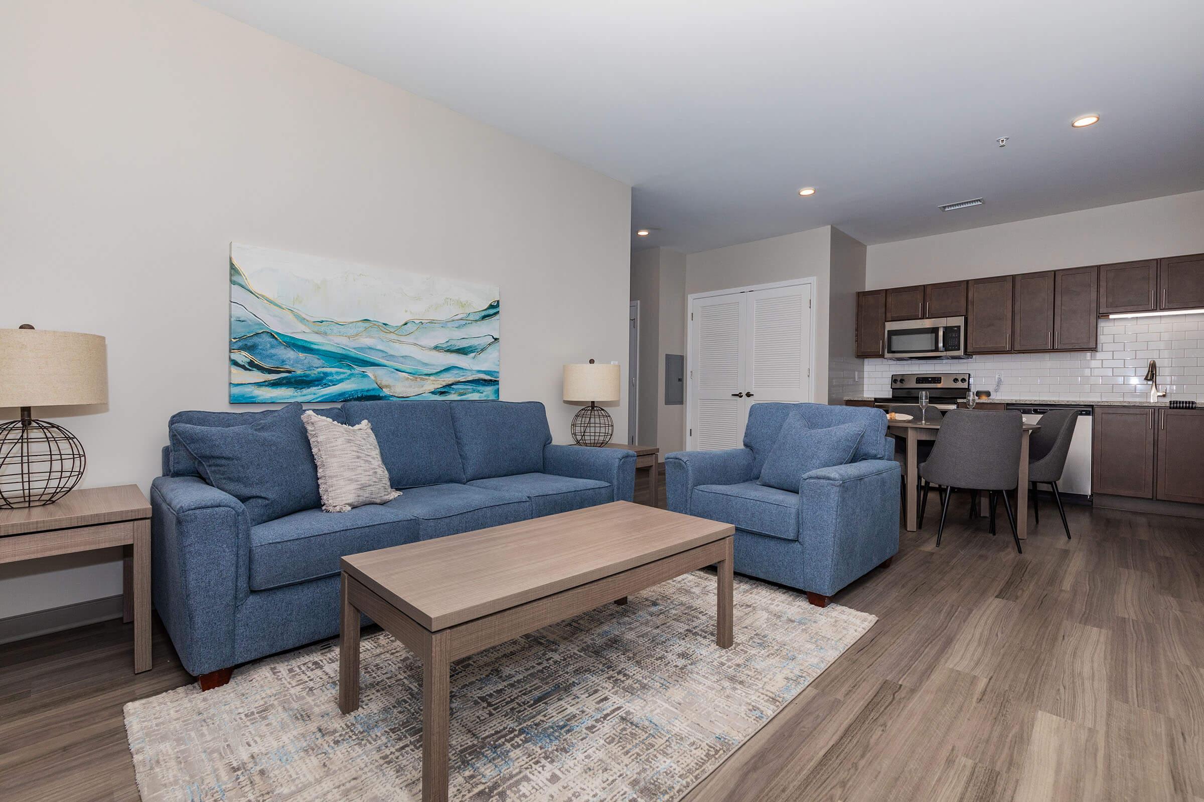 a living room with a wooden floor