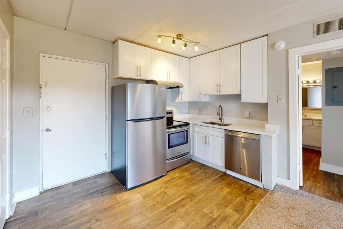 a kitchen with a wood floor