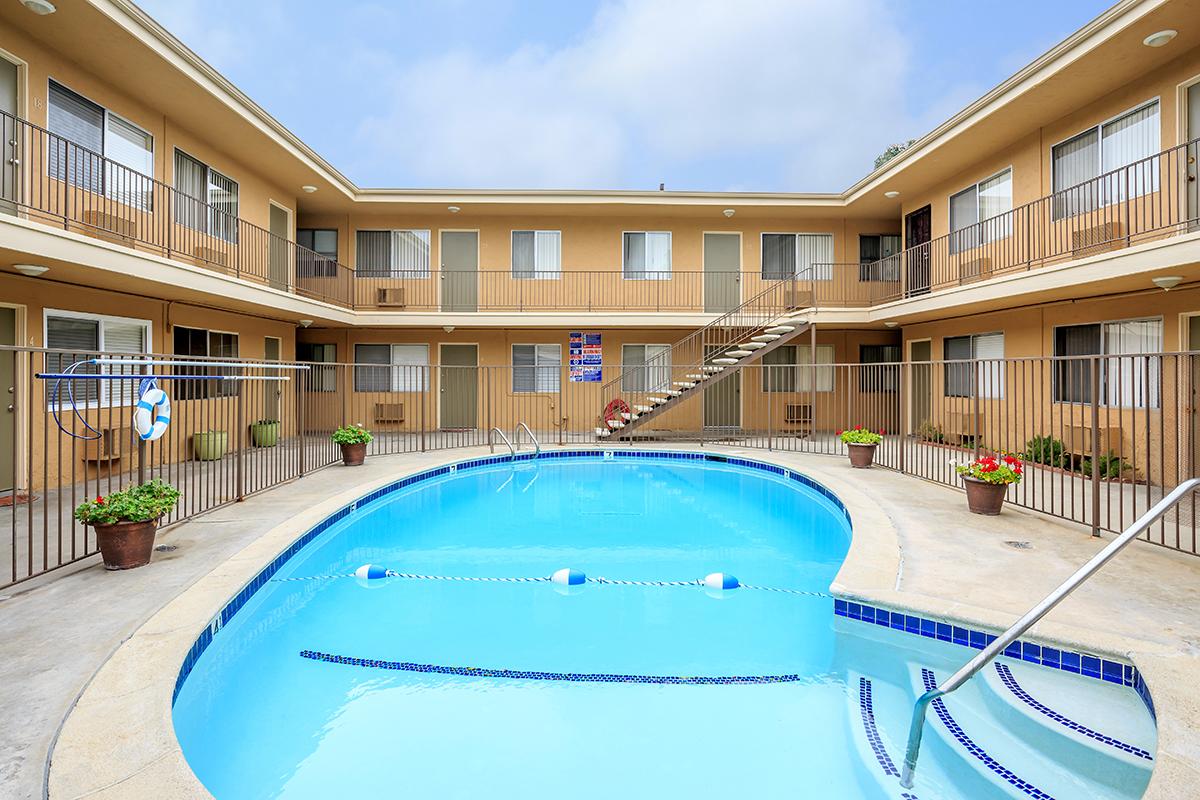 a pool in front of a building