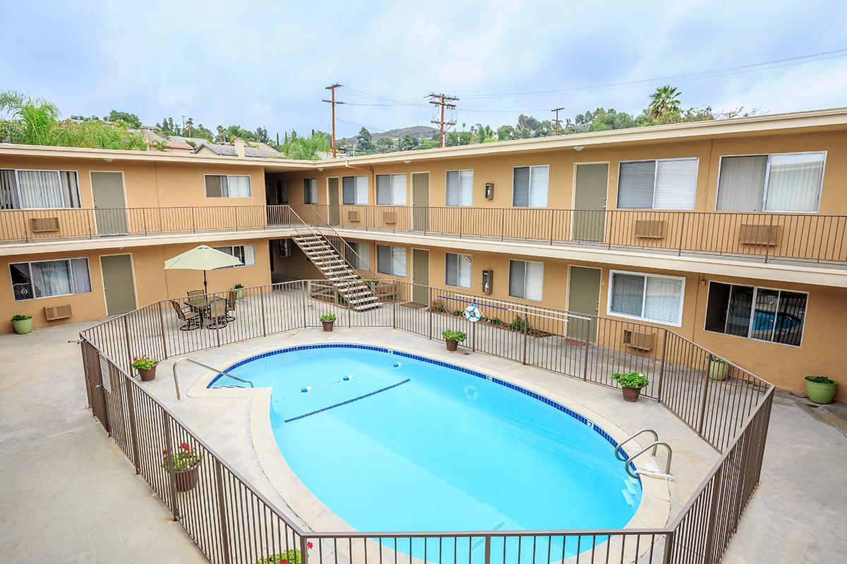 a pool next to a building