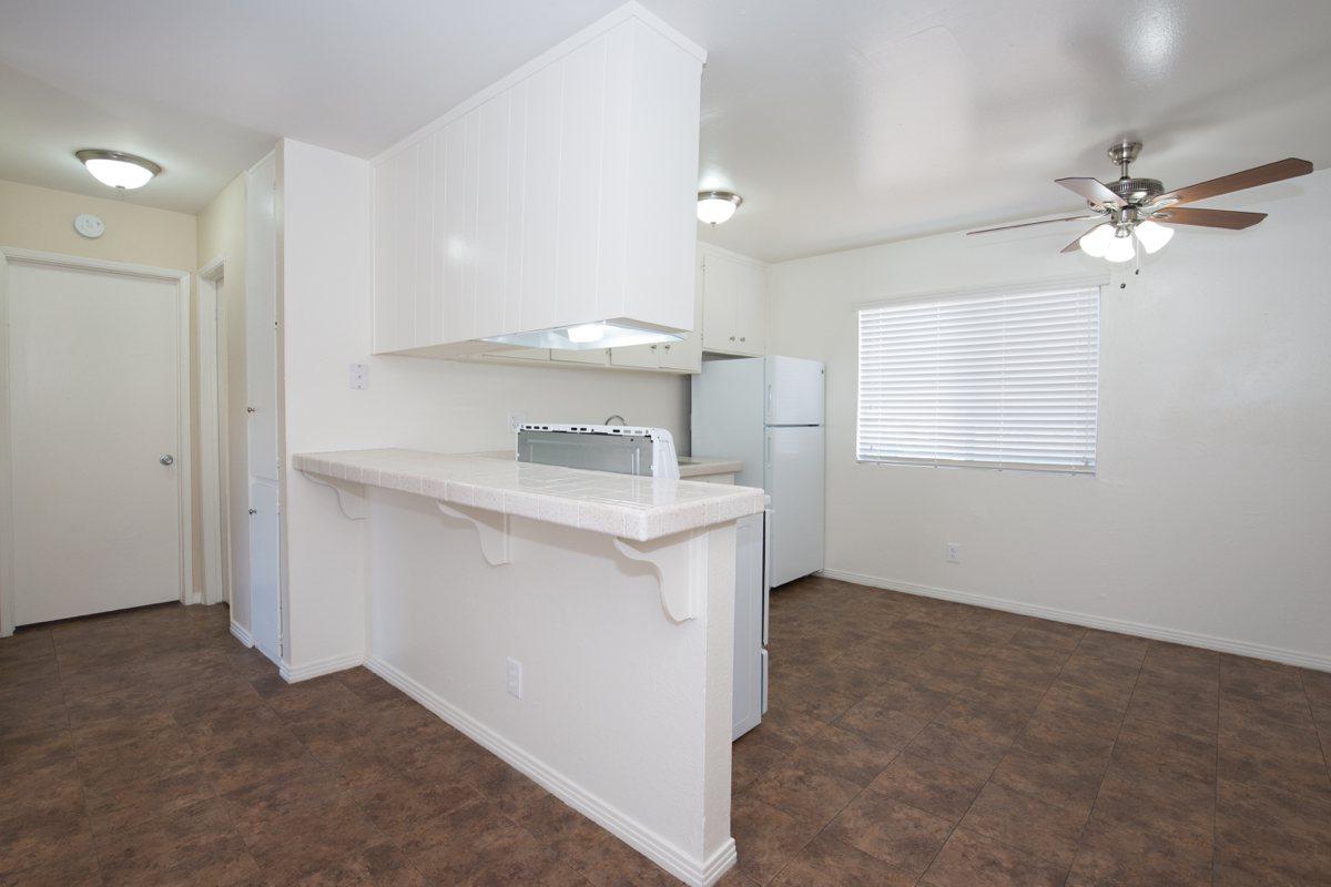 a large white refrigerator in a room