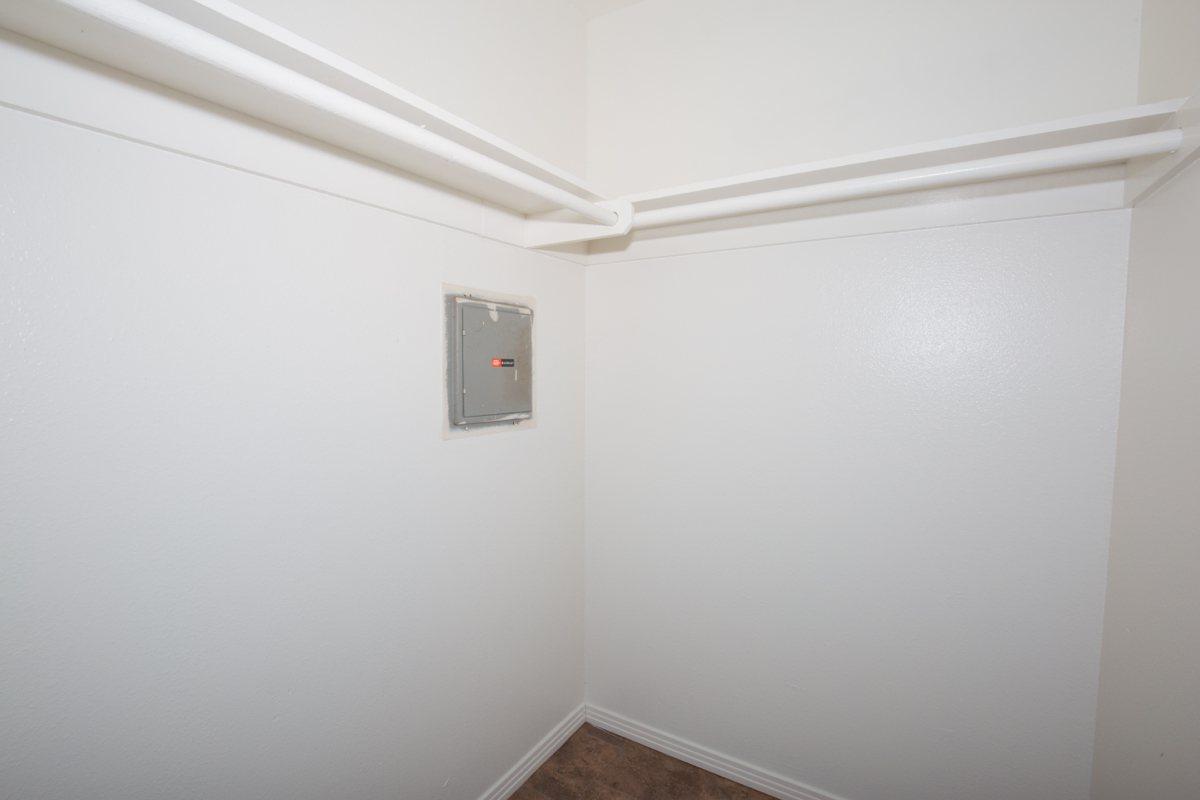 a white sink sitting next to a door