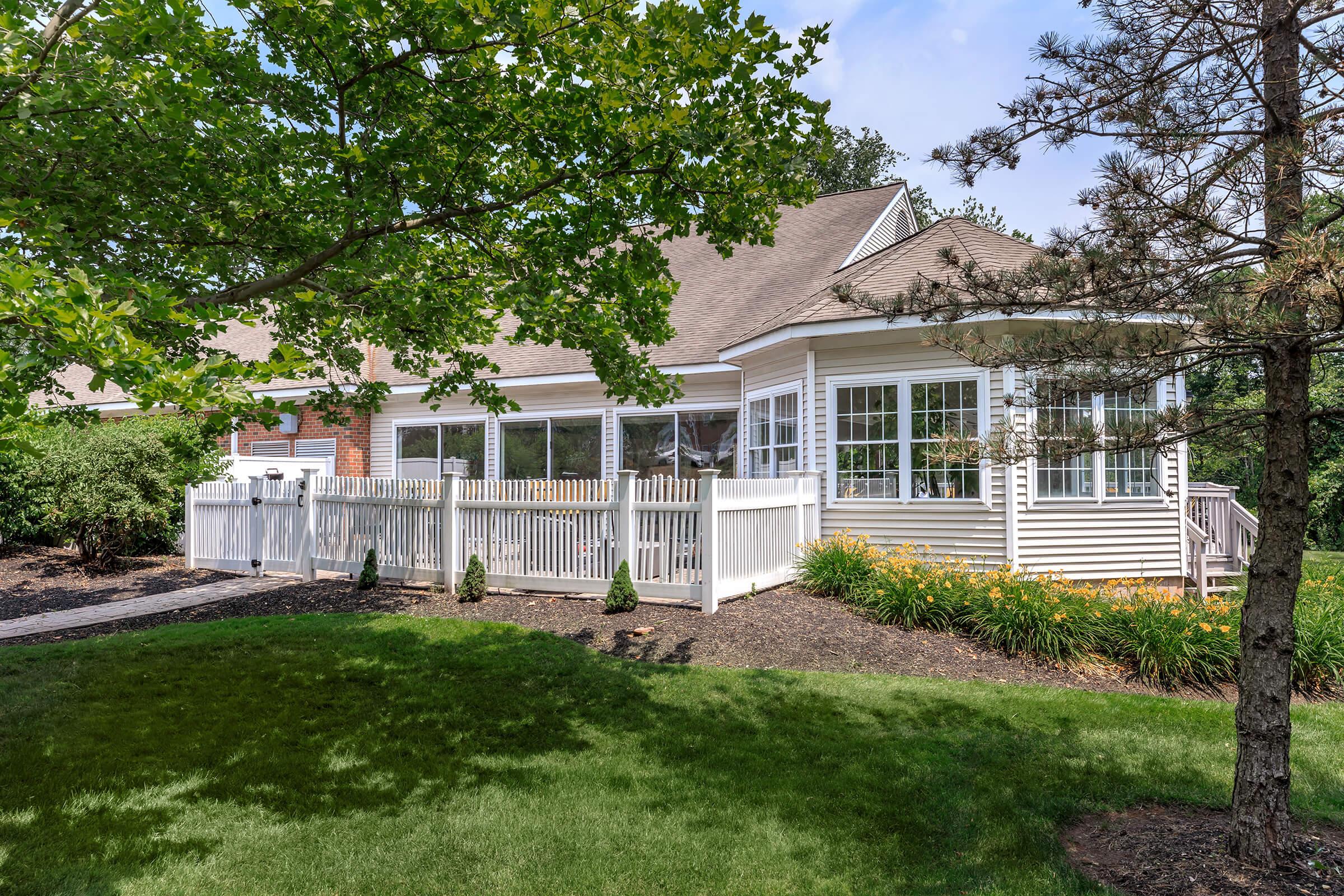 a large lawn in front of a house