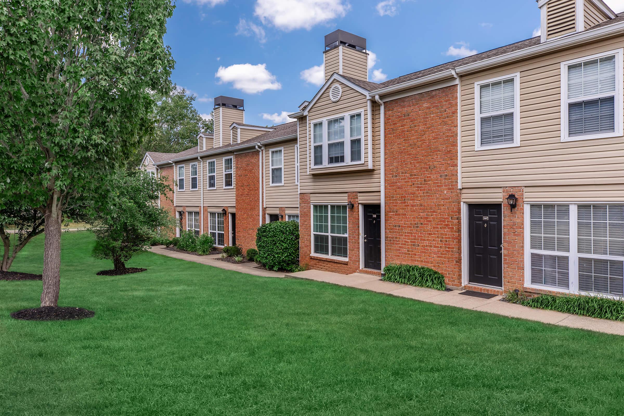 a large lawn in front of a house