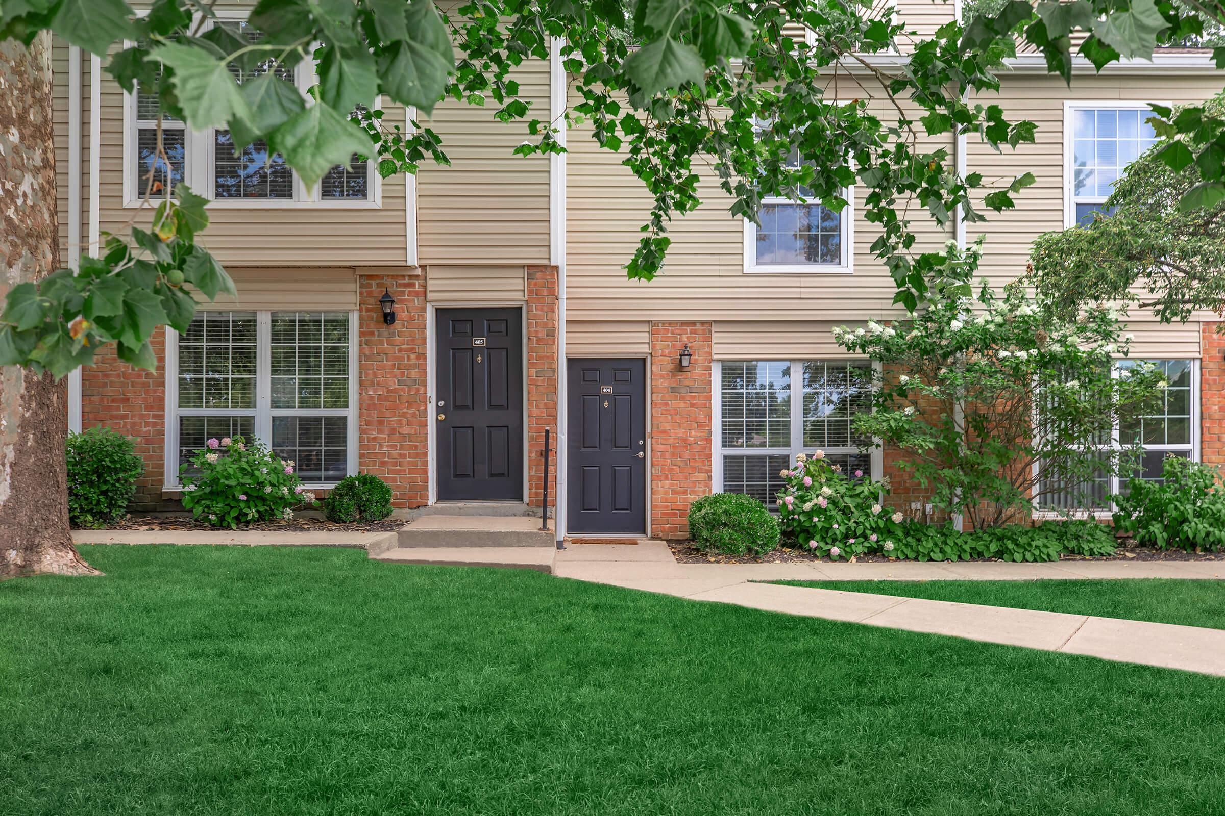 a large lawn in front of a house