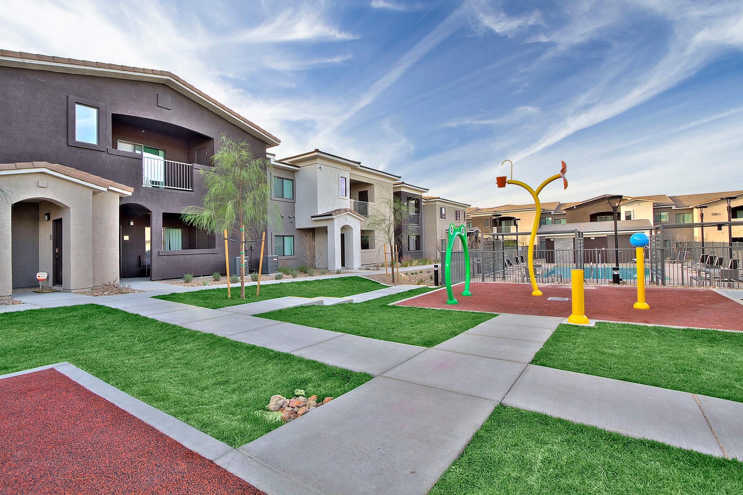 a large lawn in front of a building