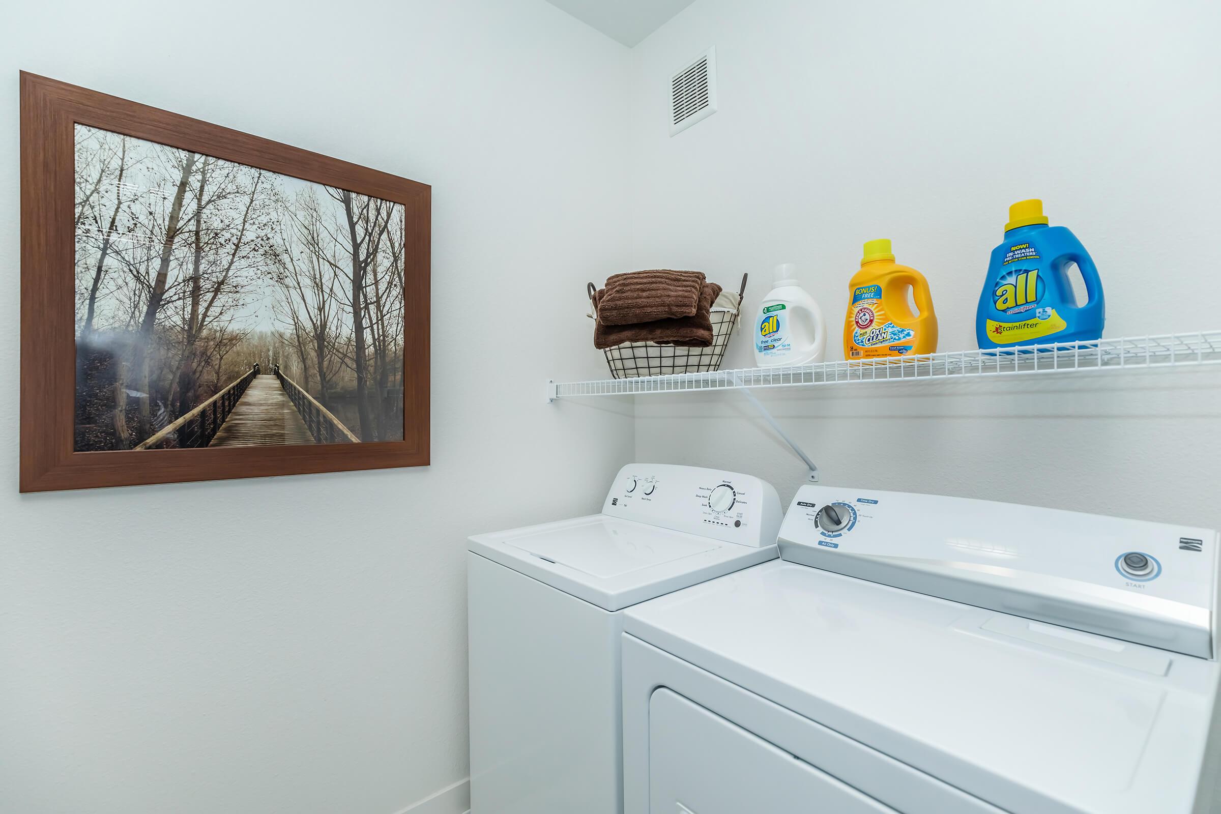 a kitchen with a sink and a mirror