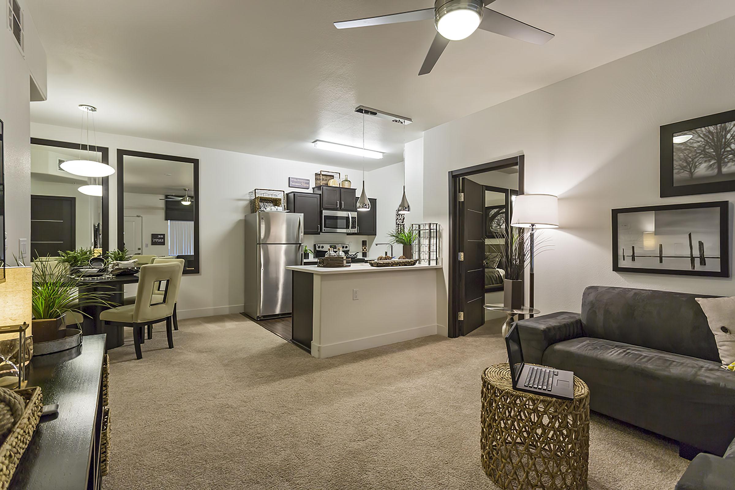 a living room filled with lots of furniture