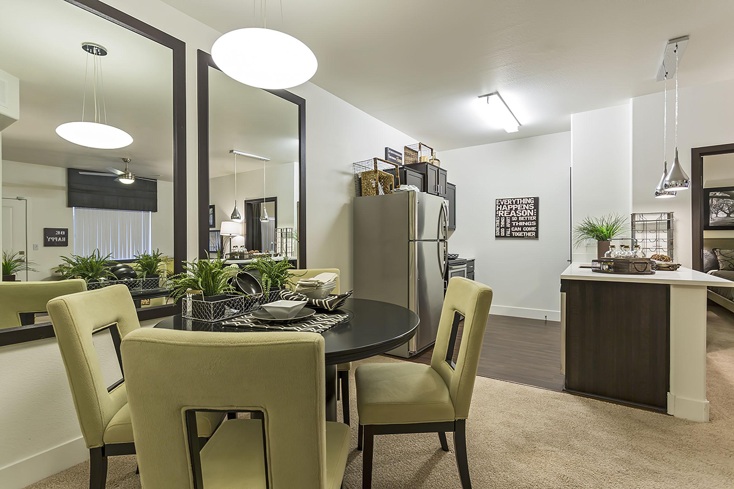 a living room filled with furniture and a table