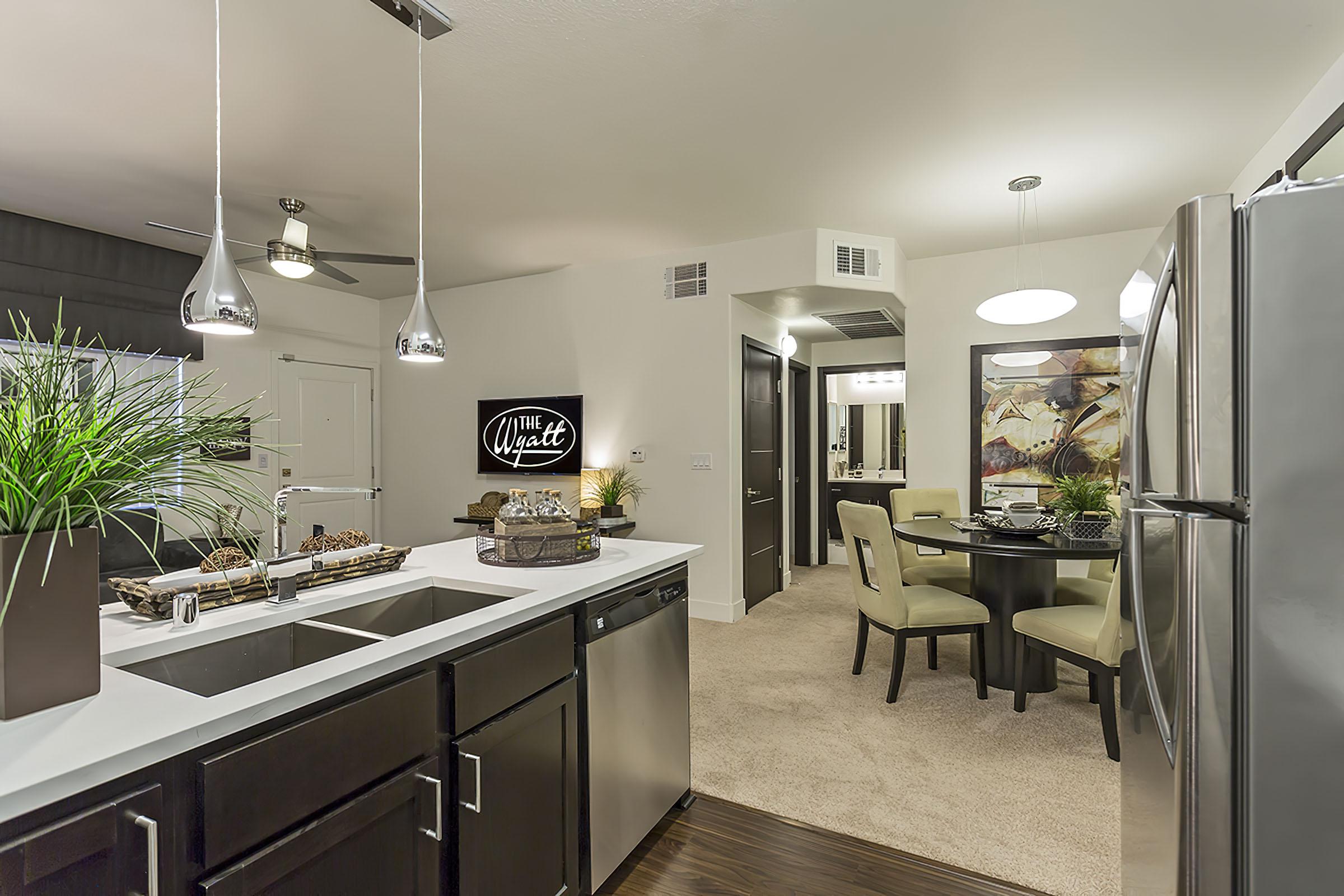 a kitchen with a table in a room