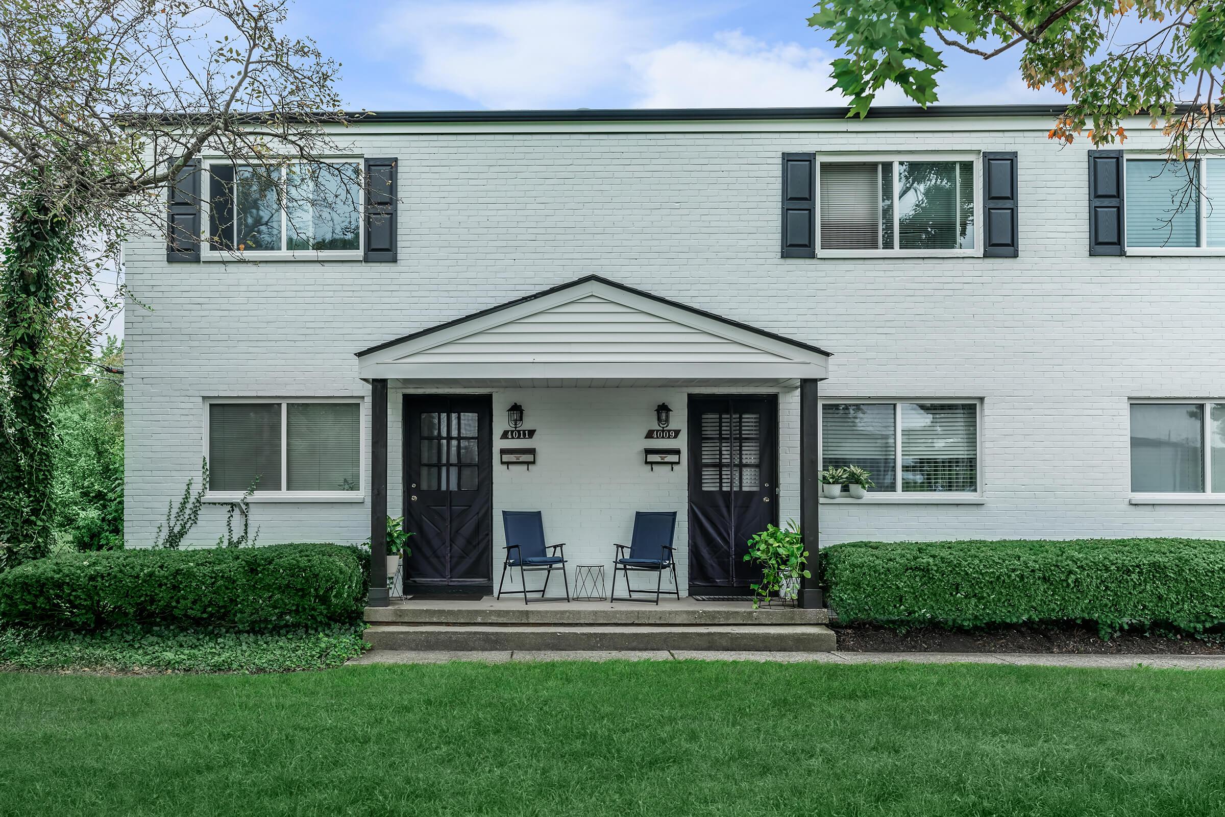 a large lawn in front of a house