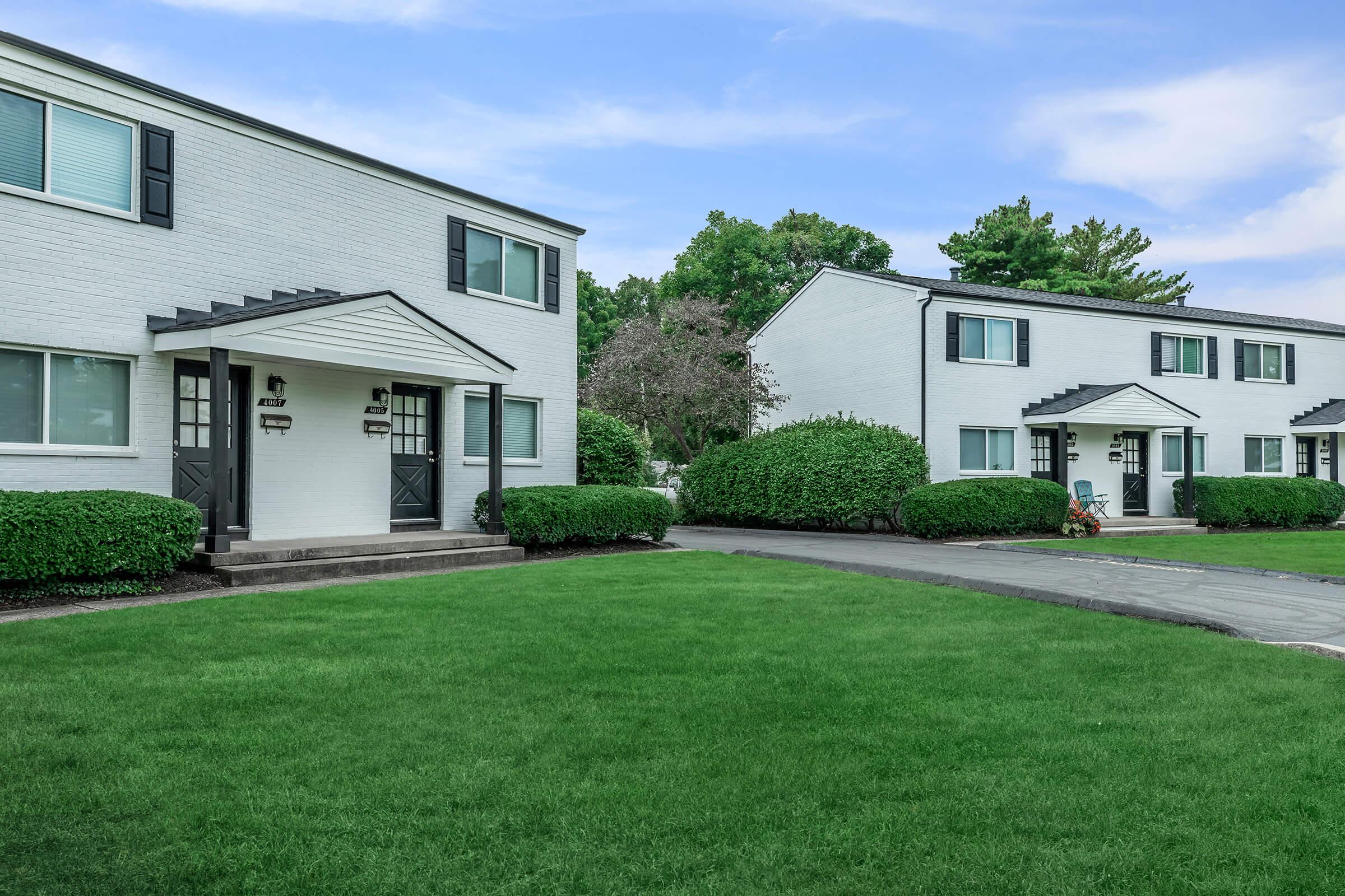 a large lawn in front of a house