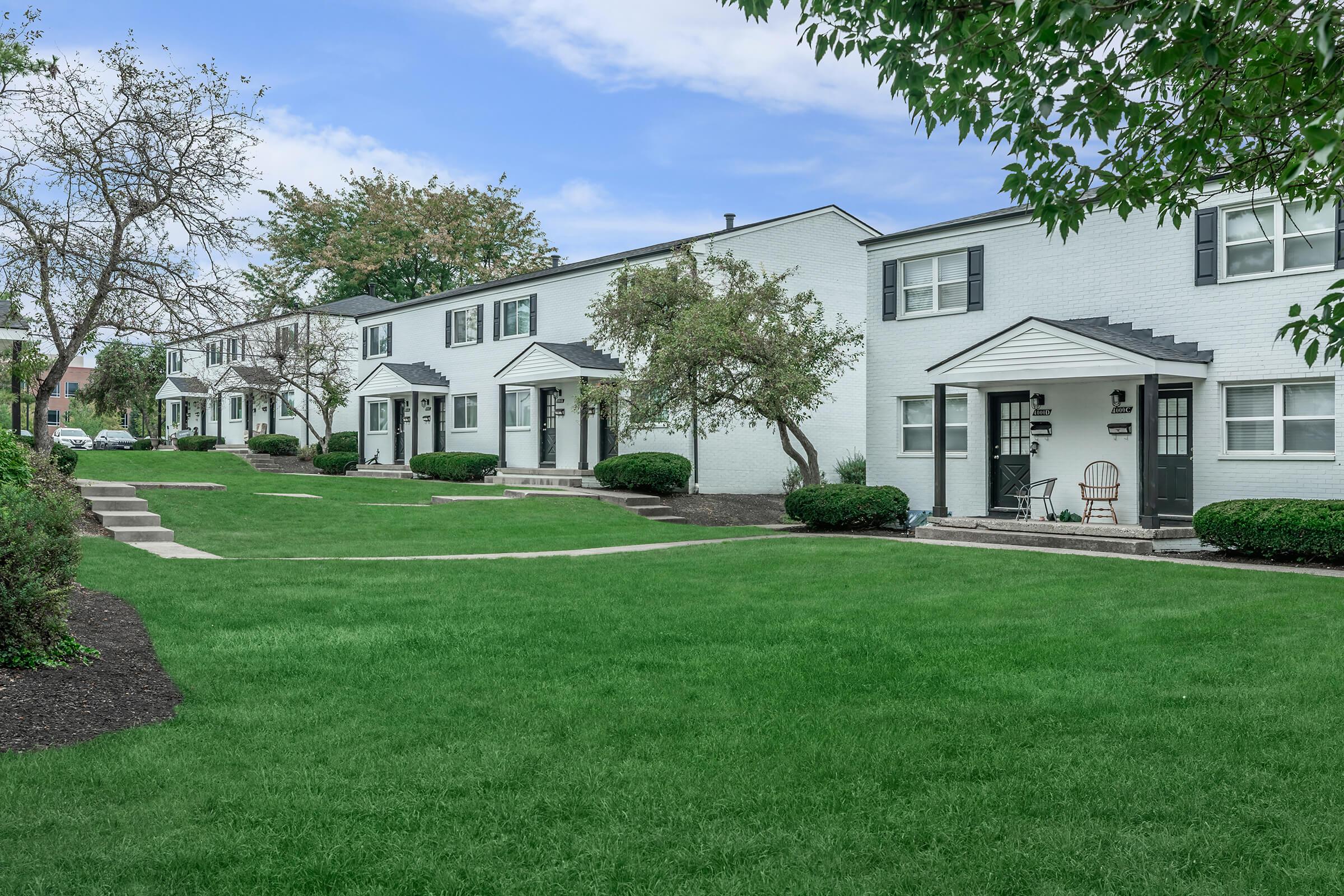 a large lawn in front of a house