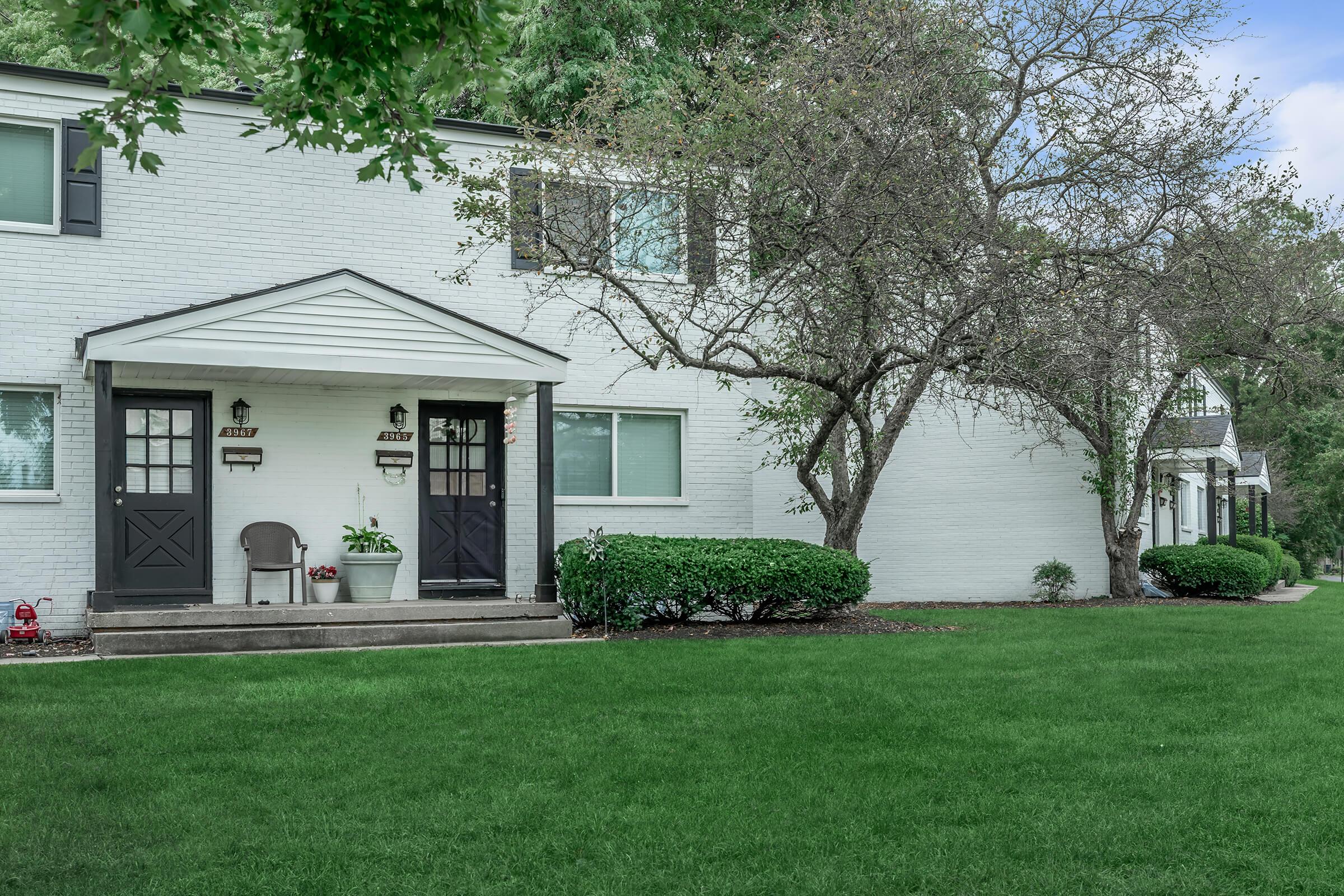 a large lawn in front of a house