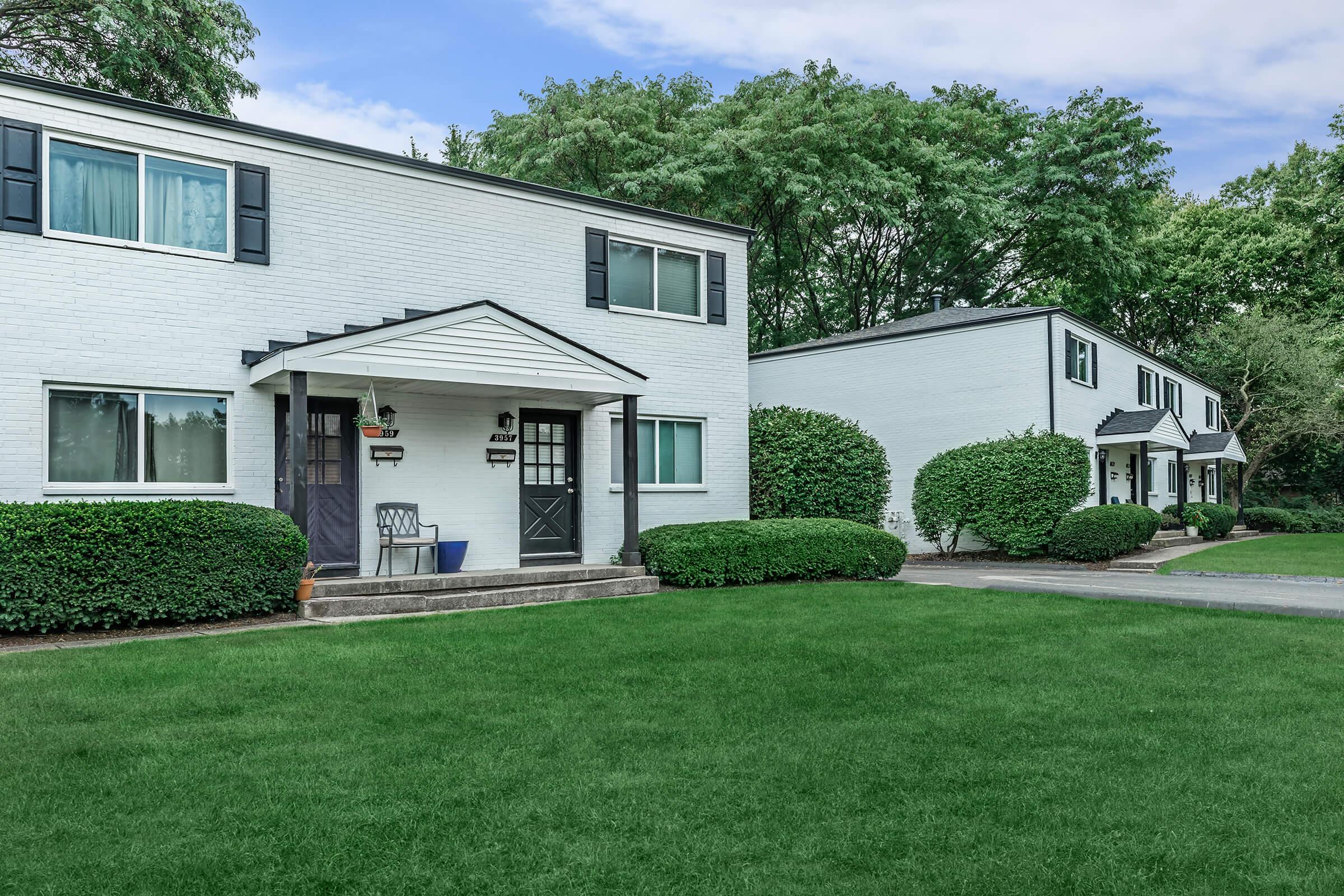 a large lawn in front of a house