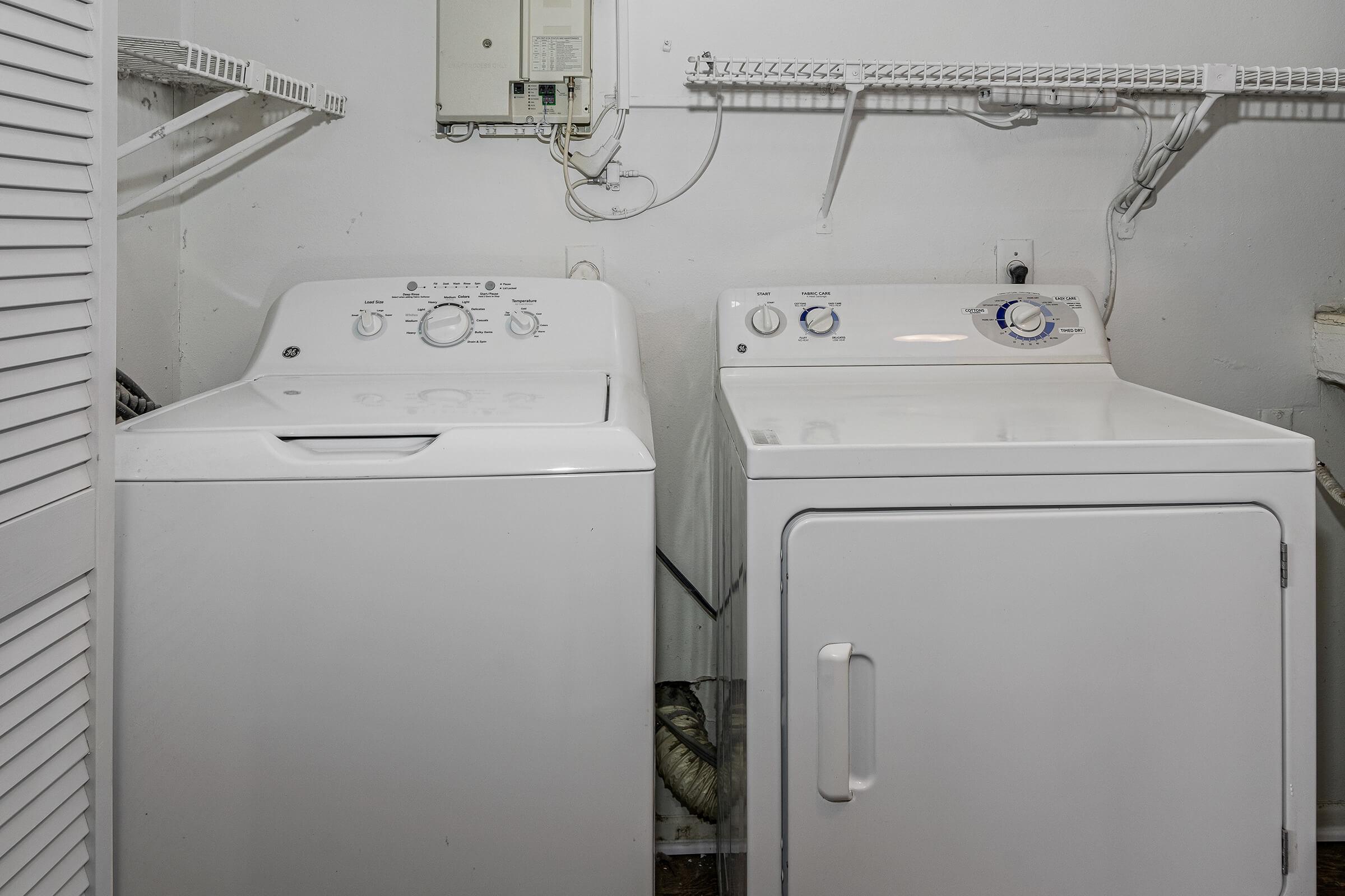 a stove top oven sitting inside of a refrigerator