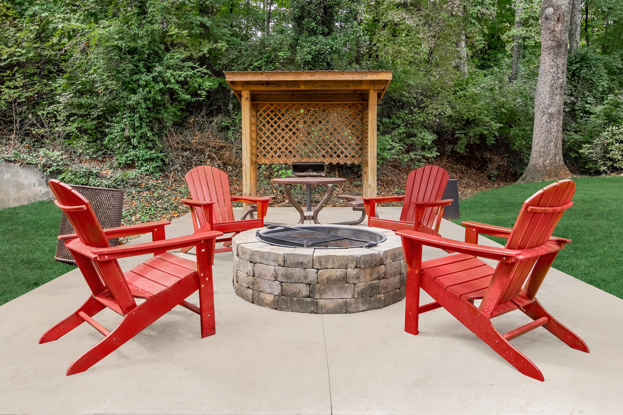 a chair sitting in front of a picnic table