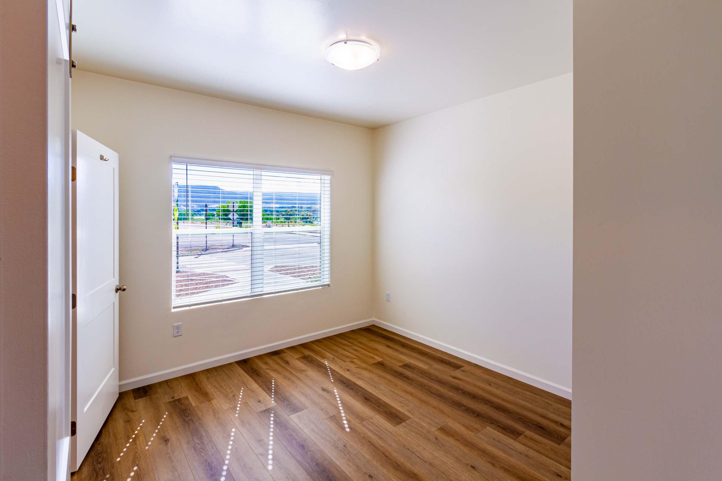 a kitchen with a wood floor