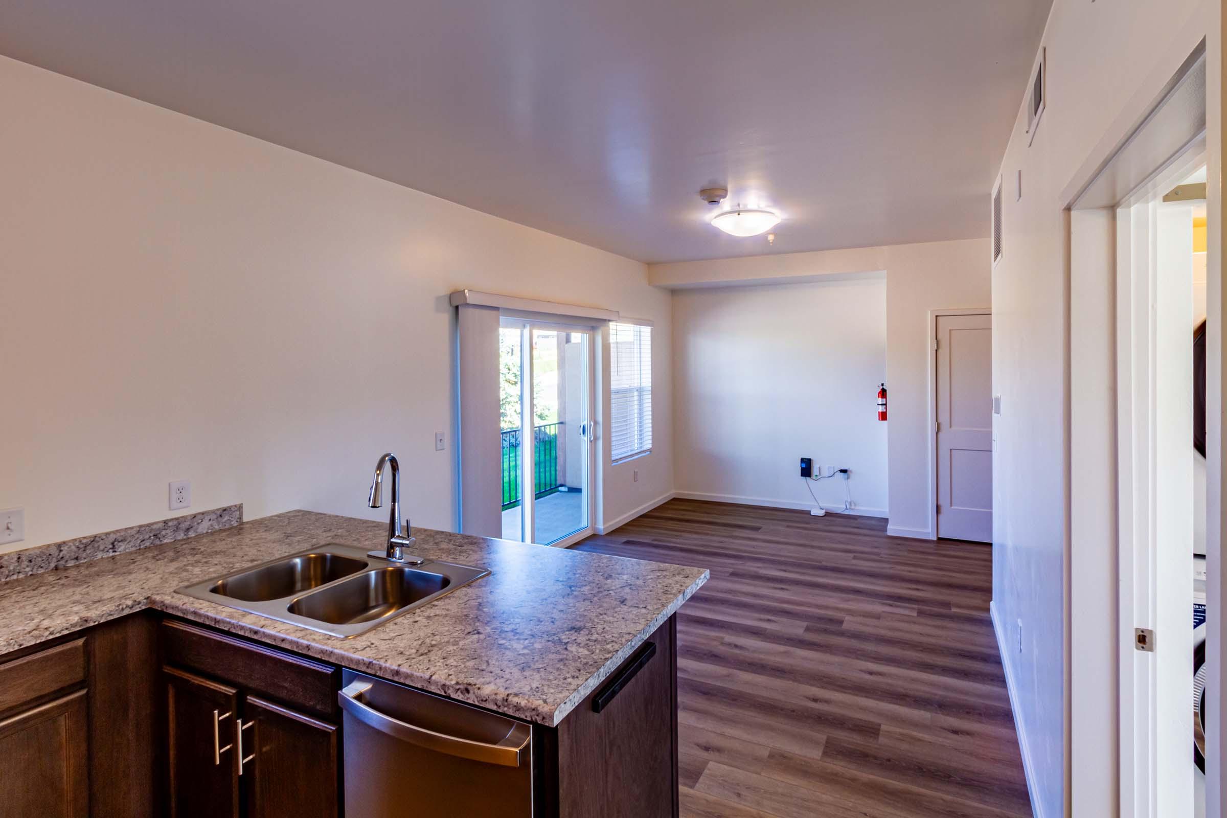 a kitchen with an island in the middle of a room