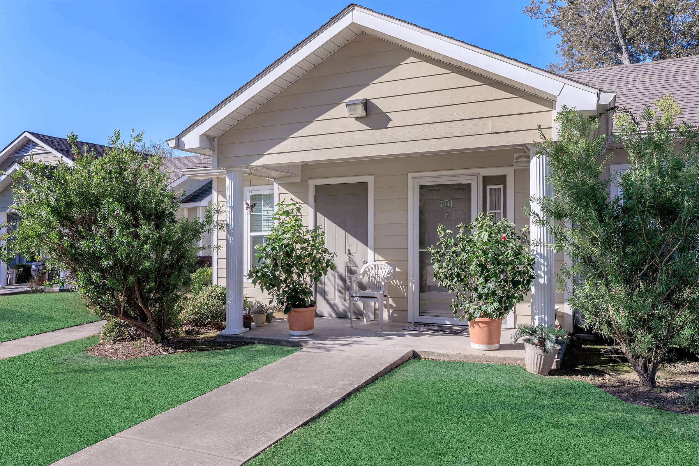 a large lawn in front of a house